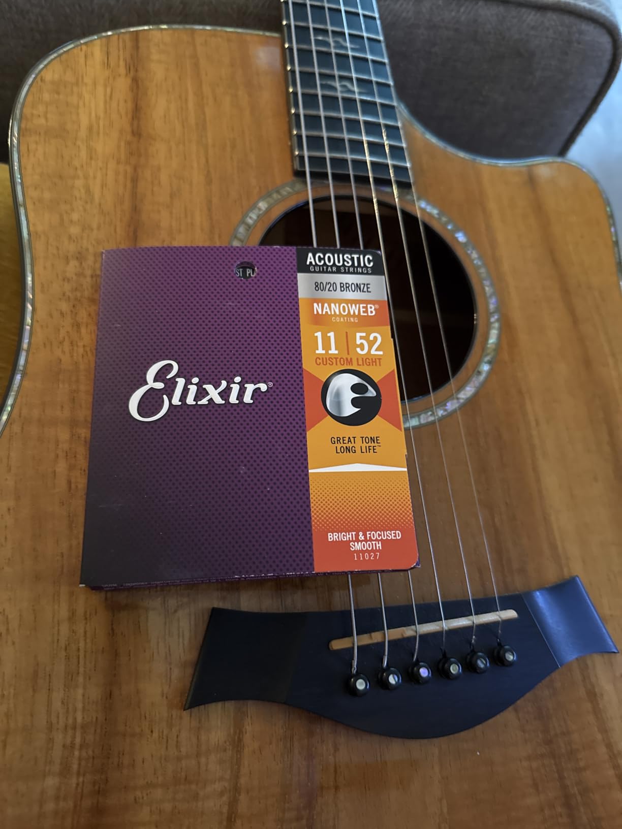 Elixir Strings, Acoustic Guitar Strings, 80/20 Bronze with NANOWEB Coating, Longest-Lasting Bright and Focused Tone with Comfortable Feel, 6 String Set, Light 12-53 Customer Review Elixir Strings, Acoustic Guitar Strings, 80/20 Bronze with NANOWEB Coating, Longest-Lasting Bright and Focused Tone with Comfortable Feel, 6 String Set, Light 12-53 - Customer Photo 2