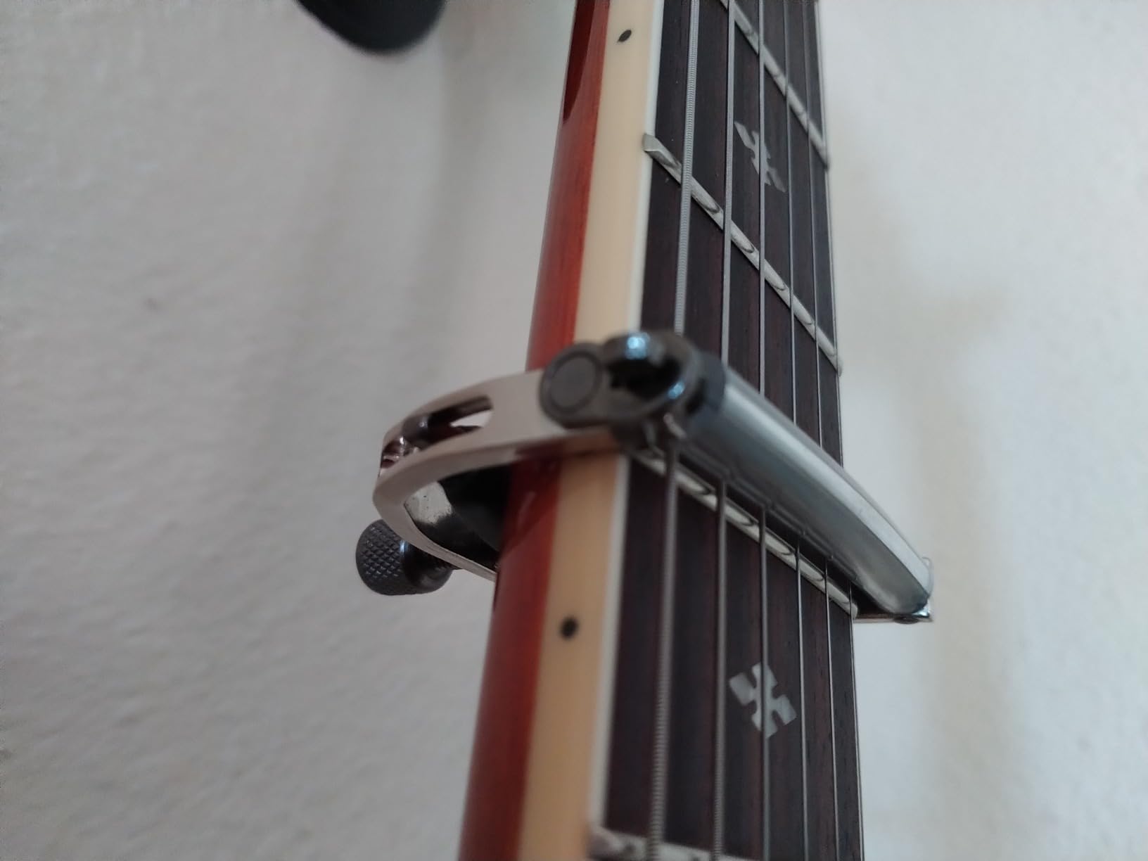 Paige 6-String Guitar Capo – Nickel, Proudly Made in the USA – Adjustable Tension, Ultra-Thin Design – Fits Standard Acoustic Guitars Customer Review Paige 6-String Guitar Capo – Nickel, Proudly Made in the USA – Adjustable Tension, Ultra-Thin Design – Fits Standard Acoustic Guitars - Customer Photo 5