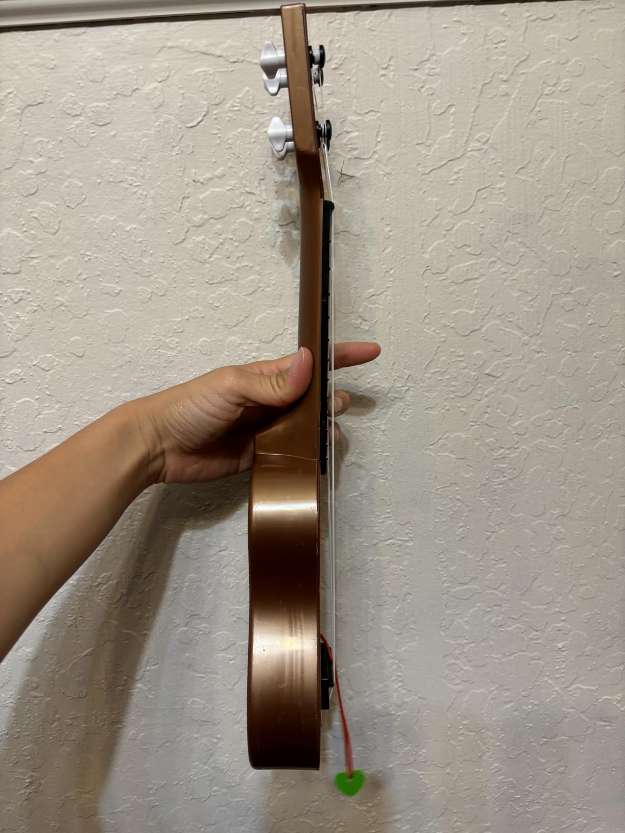 YEZI Kids Toy Classical Ukulele Guitar Musical Instrument, Brown Customer Review YEZI Kids Toy Classical Ukulele Guitar Musical Instrument, Brown - Customer Photo 1
