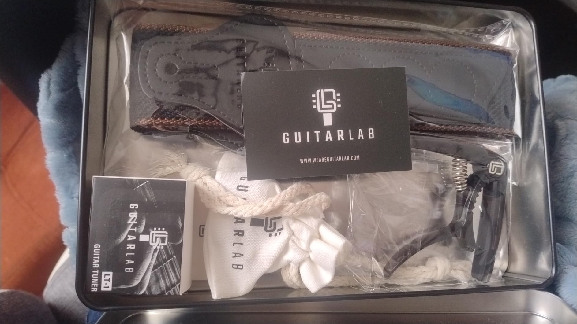 Guitar Accessories Kit by Guitar Lab – Premium Metal Tin with Guitar Strap, Capo, Tuner, Picks for Acoustic, Bass, Electric & Ukulele Guitars – Ideal Guitar Gifts for Men, Beginners, and Pros Customer Review Guitar Accessories Kit by Guitar Lab – Premium Metal Tin with Guitar Strap, Capo, Tuner, Picks for Acoustic, Bass, Electric & Ukulele Guitars – Ideal Guitar Gifts for Men, Beginners, and Pros - Customer Photo 1