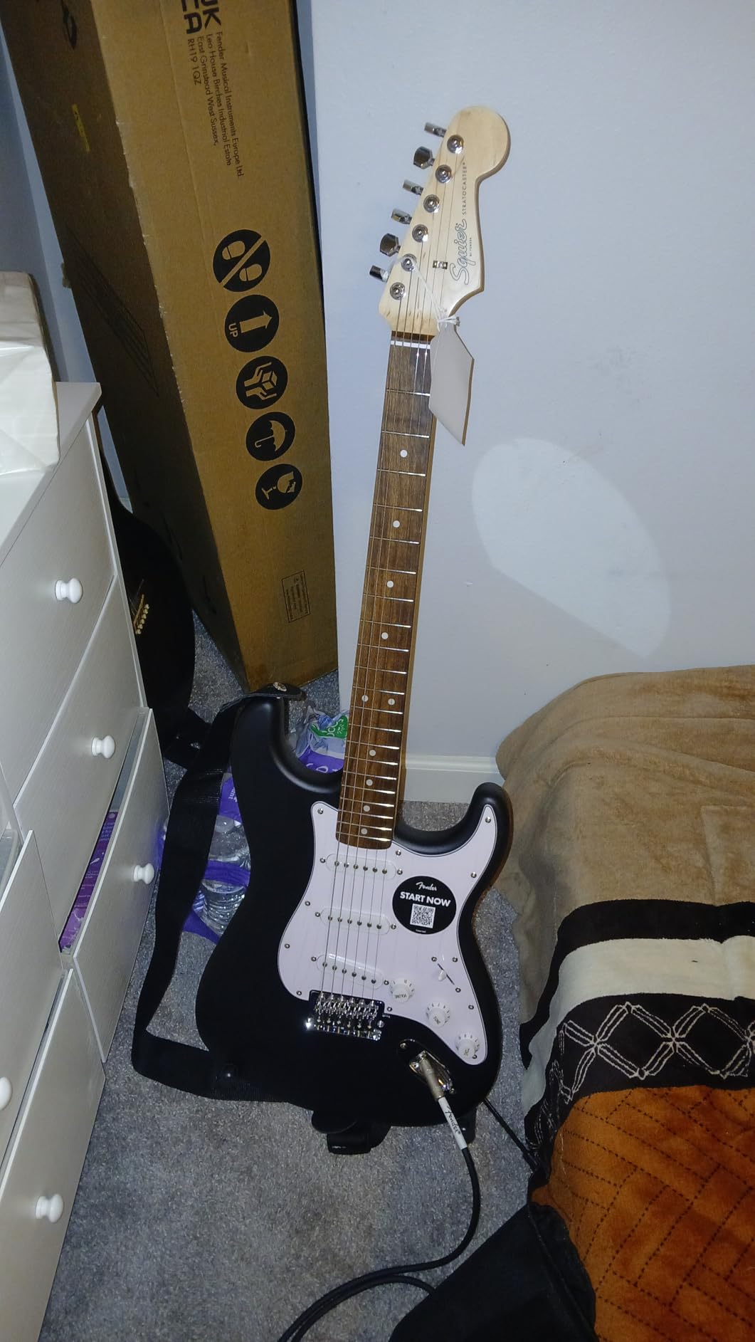 Fender Squier Debut Series Stratocaster Electric Guitar Kit, Beginner Guitar Kit, with 2-Year Warranty, with Padded Gig Bag, Frontman 10G Amp, Strap, and More, Includes Free Lessons, Black Customer Review Fender Squier Debut Series Stratocaster Electric Guitar Kit, Beginner Guitar Kit, with 2-Year Warranty, with Padded Gig Bag, Frontman 10G Amp, Strap, and More, Includes Free Lessons, Black - Customer Photo 1
