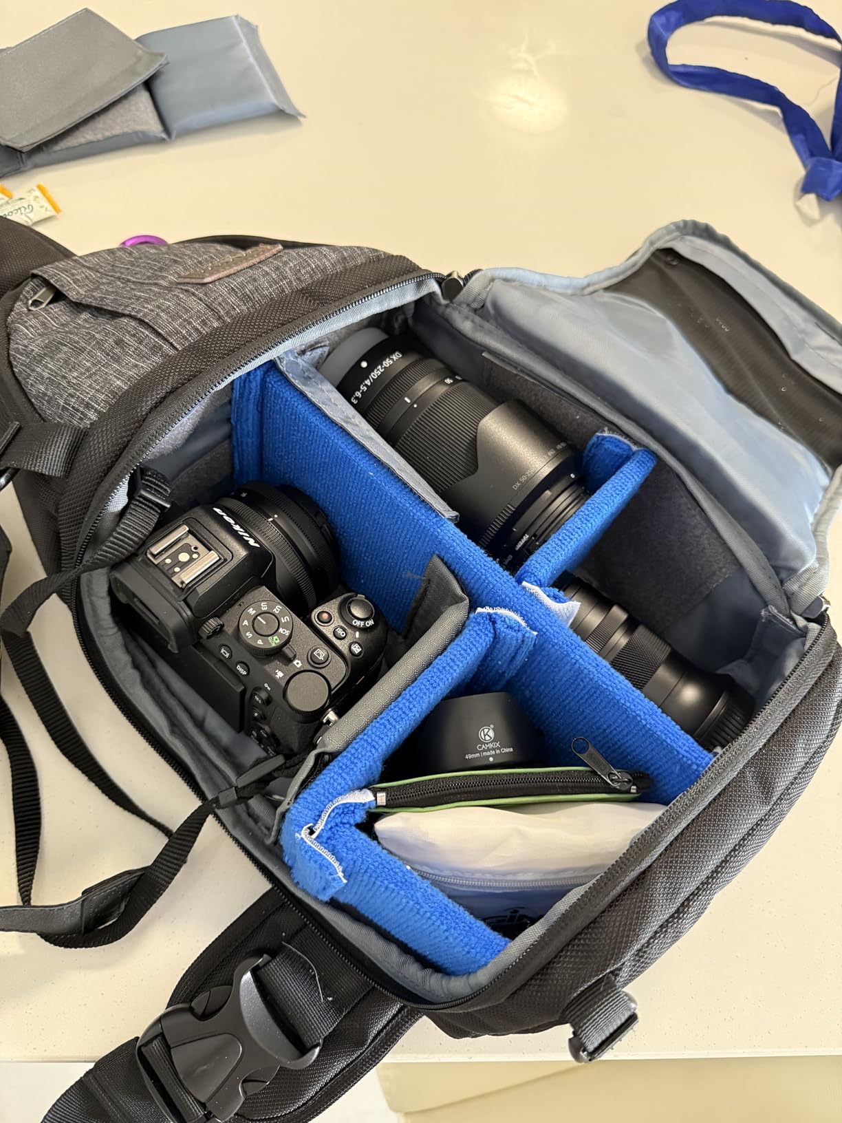 MOSISO Camera Sling Bag, DSLR/SLR/Mirrorless Camera Case Shockproof Photography Camera Backpack with Tripod Holder & Removable Modular Inserts Compatible with Canon/Nikon/Sony/Fuji, Black - Customer Photo 2