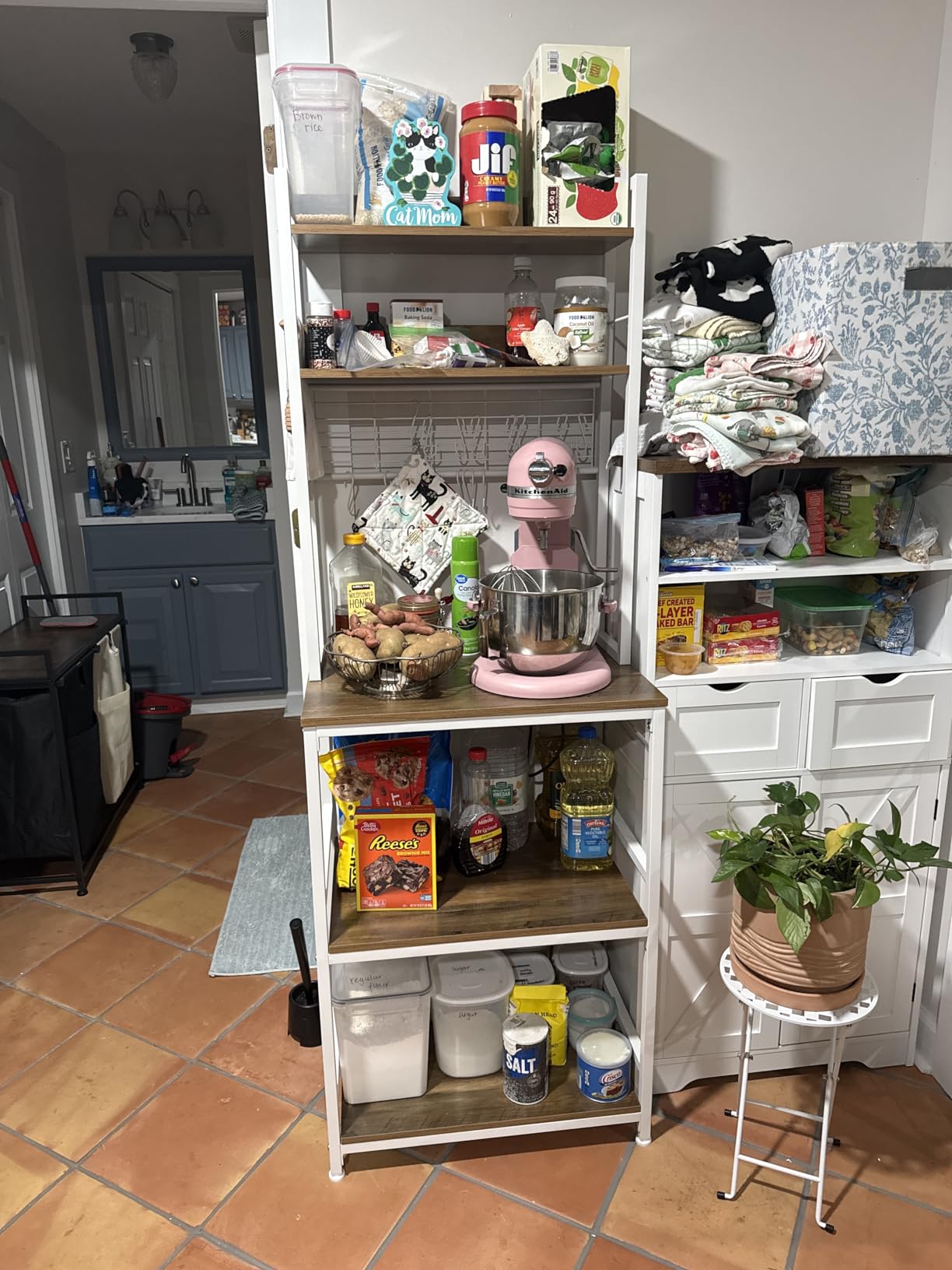 VASAGLE Bakers Rack with Power Outlet, Microwave Stand, Kitchen Tall Utility Storage Shelf, with Metal Wire Panel, 14 Hooks, 15.7 x 23.6 x 66.9 Inches, Rustic Brown and Ink Black - Customer Photo 2