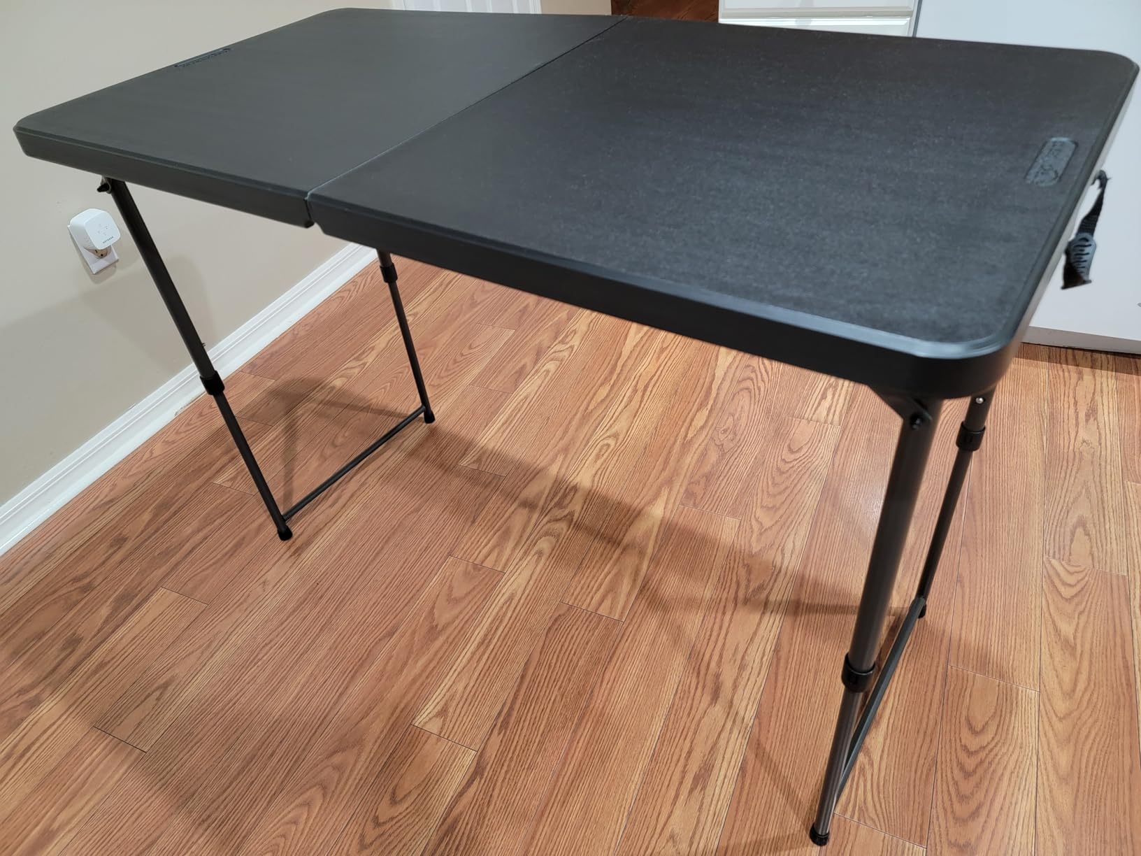 Amazon Basics 4 Foot Rectangular Folding Dining Table, 4 Adjustable Height Settings with Carrying Handle Customer Review Amazon Basics 4 Foot Rectangular Folding Dining Table, 4 Adjustable Height Settings with Carrying Handle - Customer Photo 2