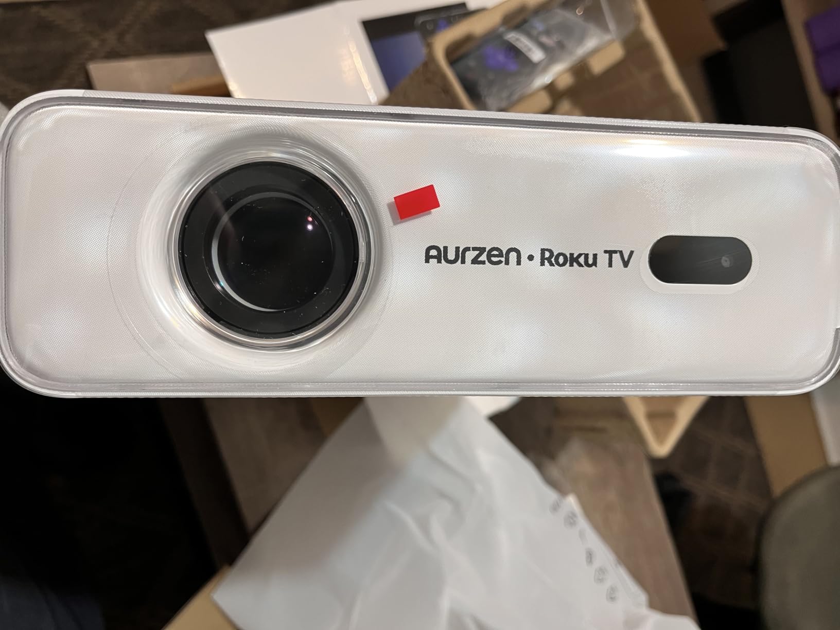 Aurzen Roku TV Smart Projector with Wifi and Bluetooth, Roku Streaming Experience Built-in, 1080P FHD, DoIby Audio, Auto Focus & Keystone, Zoom, Movie Portable Outdoor Mini Projector, White customer photo 1