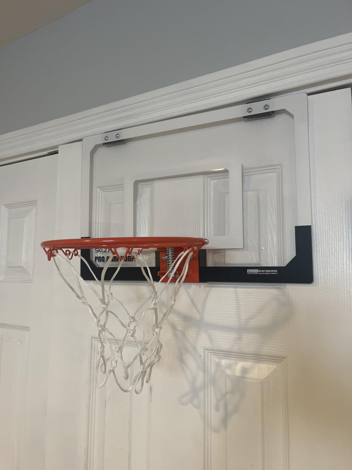 SKLZ Pro Mini Indoor Basketball Hoop with Ball, Over the Door, Shatter-Proof Backboard, Spring-Action Break-Away Steel Rim customer photo 1