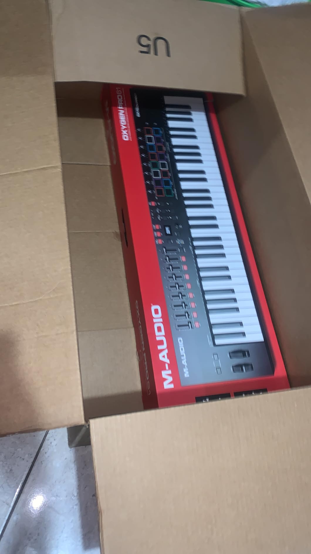 M-Audio Oxygen Pro 61 Key USB MIDI Keyboard Controller With Beat Pads, MIDI-assignable Knobs, Buttons and Faders, and Native Instruments Sound Package (NKS Integration) customer photo 1