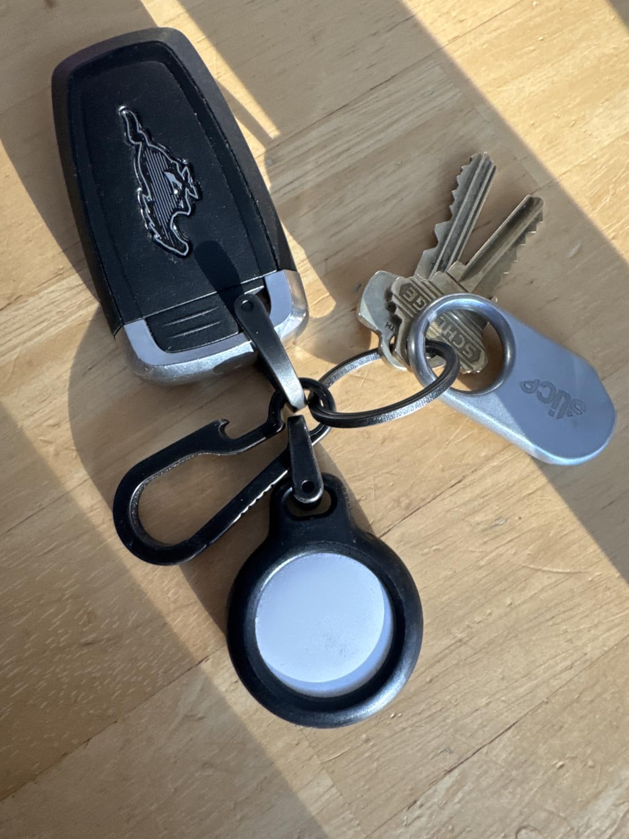 Belkin Apple AirTag Secure Holder with Key Ring - Durable, Scratch-Resistant Case with Open Face & Raised Edges - Protective AirTag Keychain Accessory for Keys, Pets, Luggage, & More - Black customer photo 1