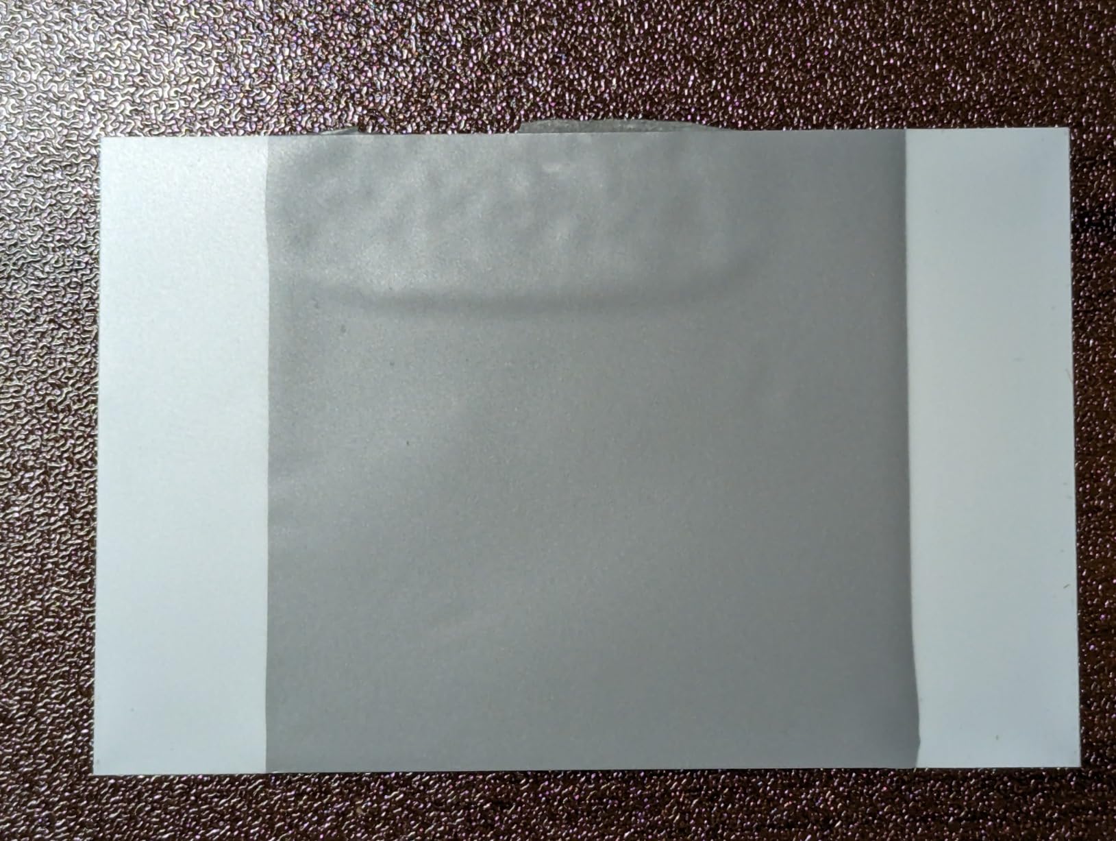 Gelid Solutions HeatPhase Ultra Compatible with AMD, 40x40x0.2mm, 8.5W/mk Thermal Pad for CPU, Easy Application, Non-Electrical Conductive, Color Gray customer photo 2