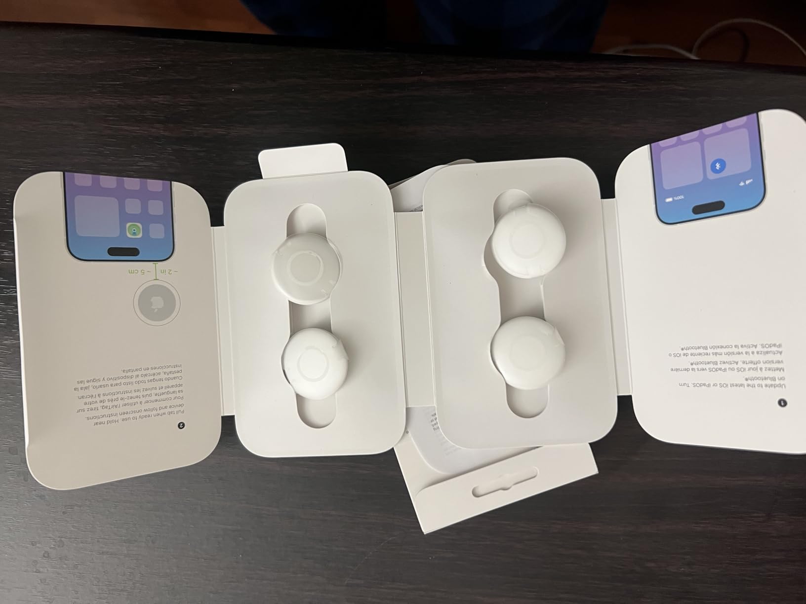 Apple AirTag (1st Generation) - 4 Pack. Keep Track of and find Your Keys, Wallet, Luggage, Backpack, and More. Simple one-tap Set up with iPhone or iPad, Bluetooth customer photo 1