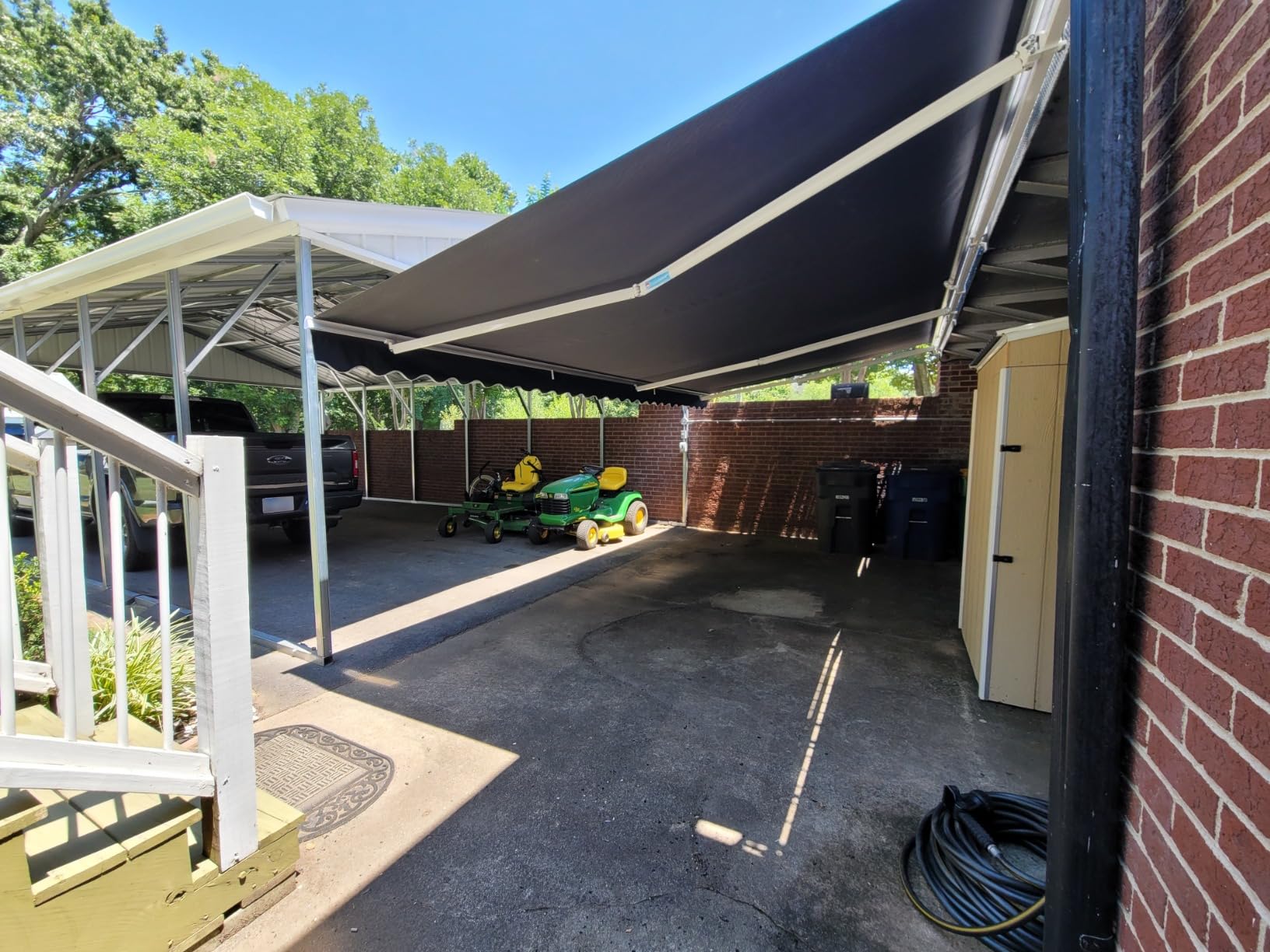 Aleko 10x8 feet Caribbean Style Electric White Frame Awning, Remote Control Motorized & Manual Crank, Outdoor Shade Canopy with UV-Resistant Fabric - Onyx Black customer photo 1