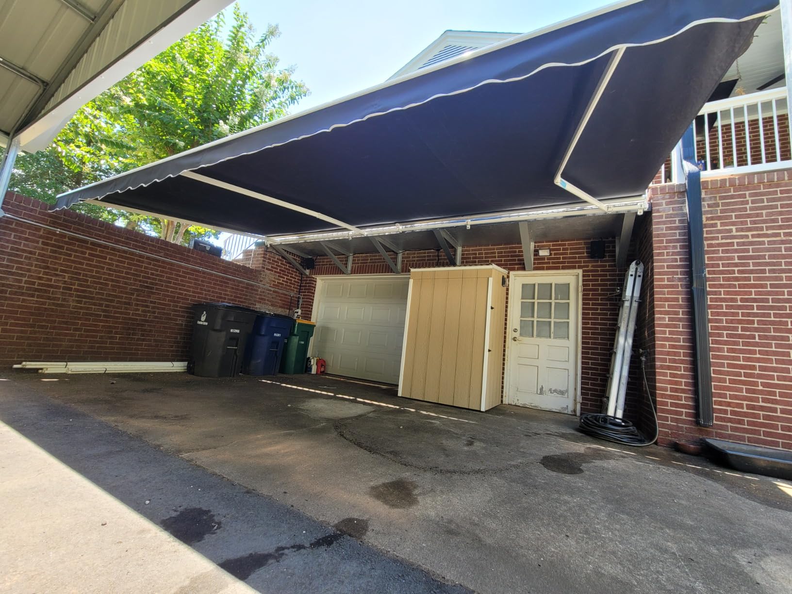 Aleko 10x8 feet Caribbean Style Electric White Frame Awning, Remote Control Motorized & Manual Crank, Outdoor Shade Canopy with UV-Resistant Fabric - Onyx Black customer photo 2