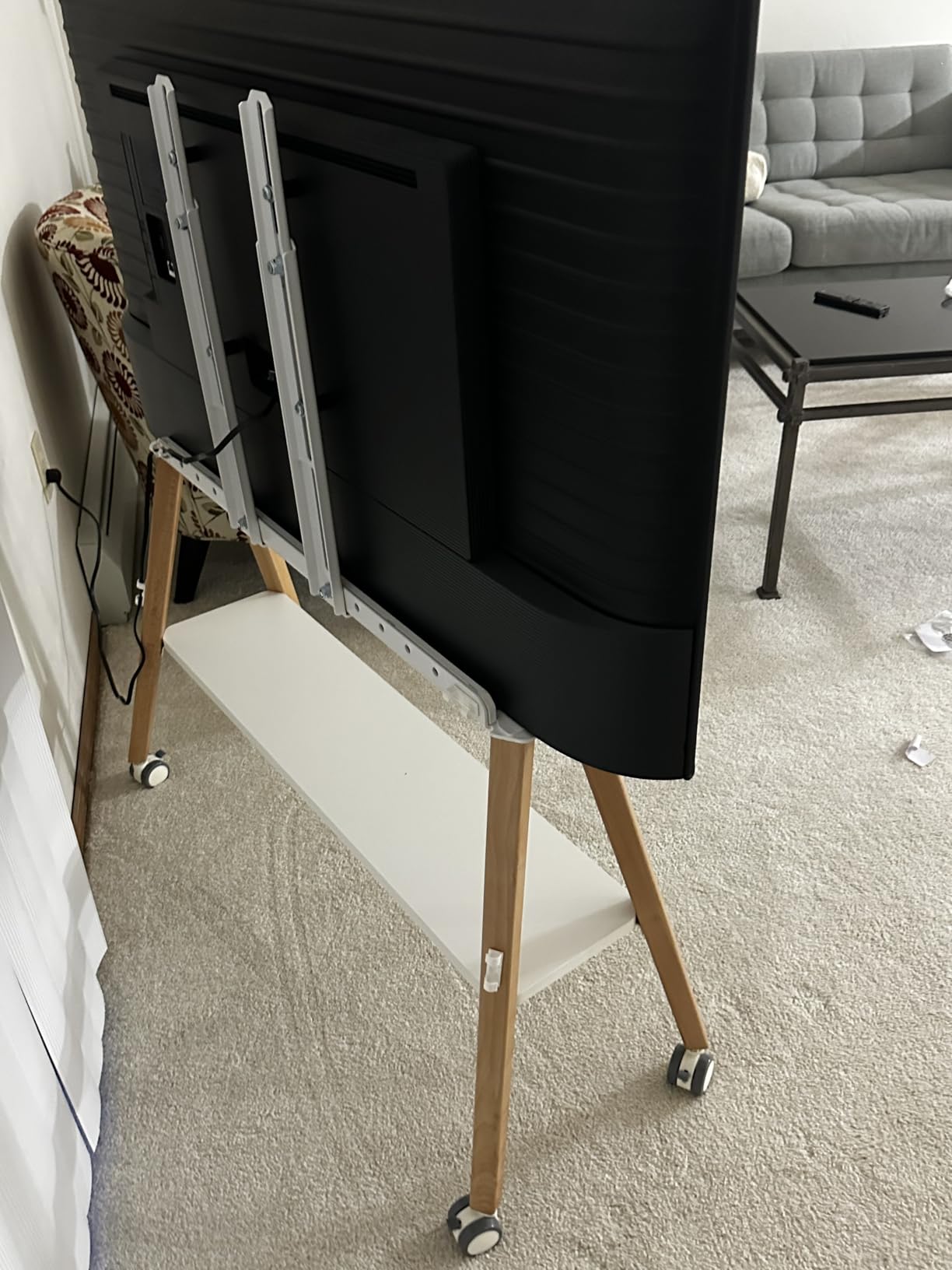 Rolling TV Stand for 49 to 75 Inch TV up to 40 kg, Easel TV Stand with Metal Structure and Wooden Shelf, Moveable TV Cart on Wheels for Office, Business, Home, Black customer photo 2
