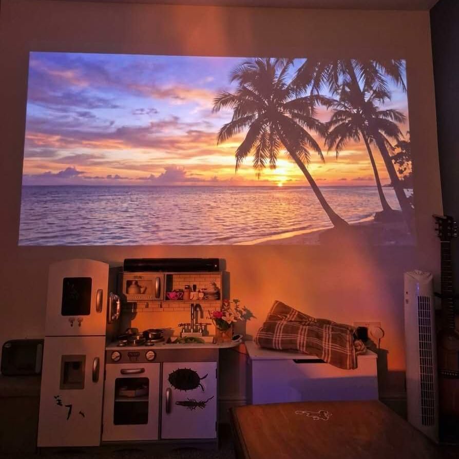 Smart Projector [Google TV Built-in & 4K Support] with WiFi and Bluetooth, Portable Mini Movie Short Throw Projector Outdoor with Built-in Apps Auto Focus Keystone customer photo 2