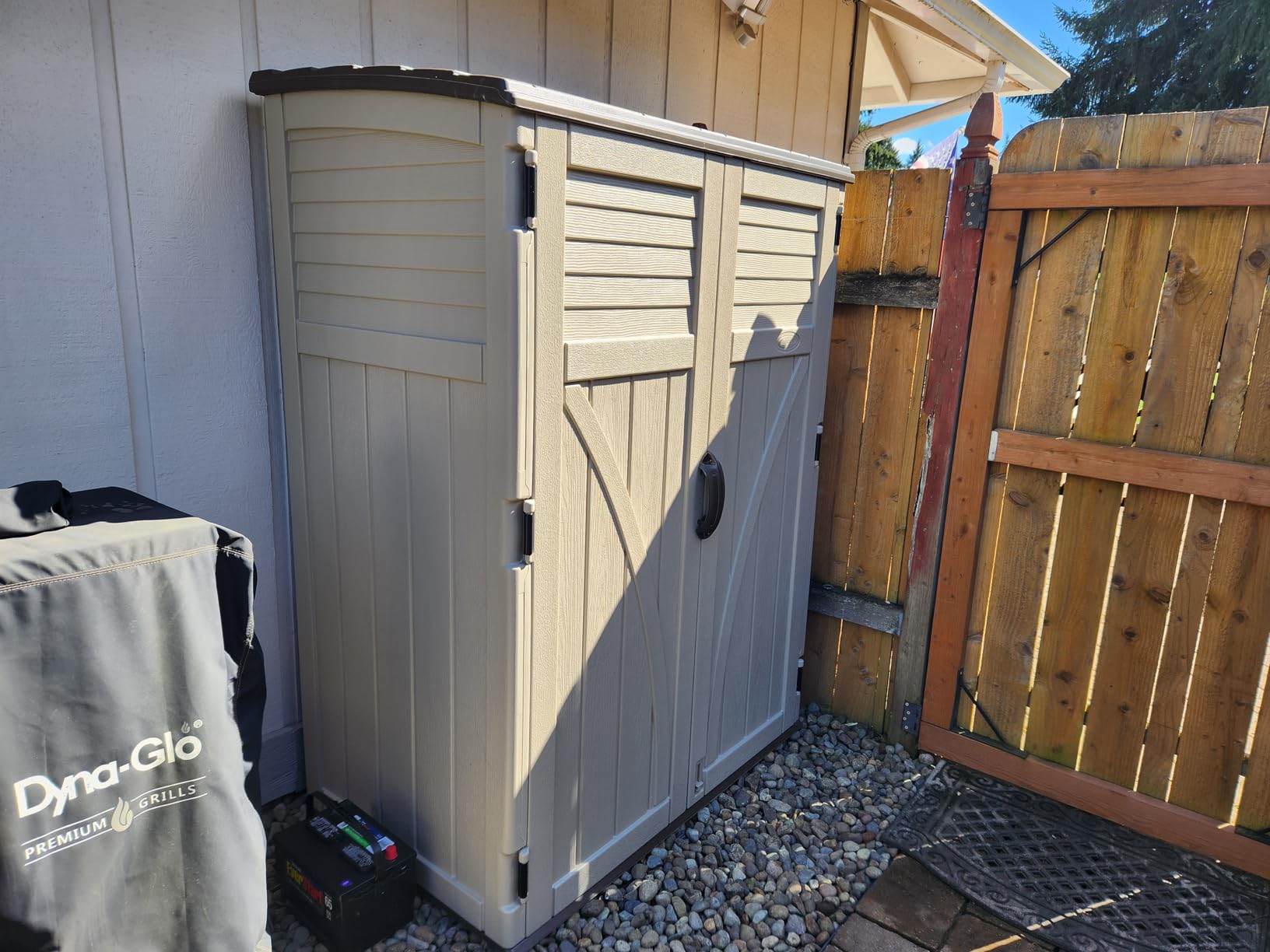 Suncast Outdoor Storage Shed, Water Resistant Resin Vertical Outdoor Storage Cabinet for Patio, Garden Tools, 54 cu. ft., Made in USA customer photo 1