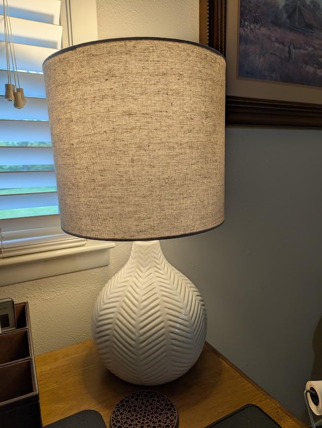 Signature Design by Ashley Wardmont Contemporary Modern Table Lamp with Drum Hardback Fabric Shade, On-Off Switch, Ceramic, 17.75