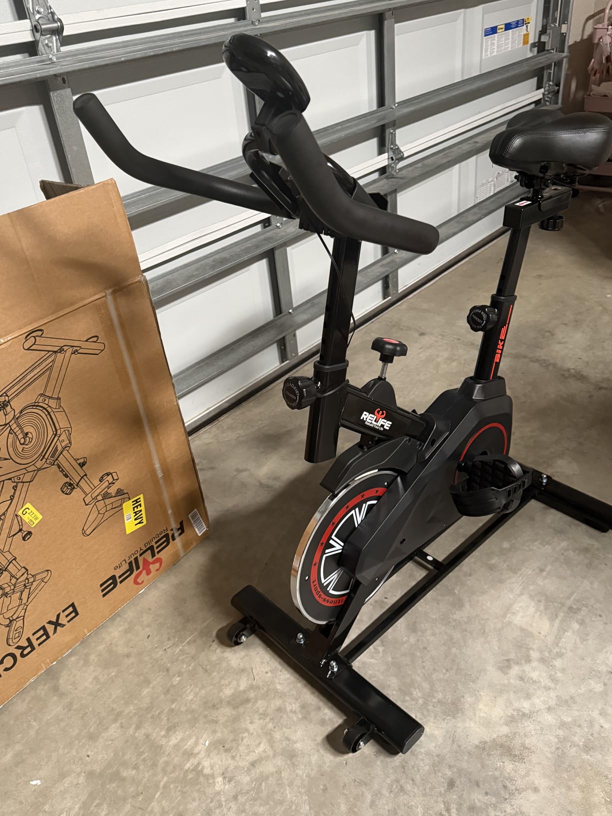 RELIFE REBUILD YOUR LIFE Exercise Bike Stationary for Home Indoor,Cycling Bike with Silent Belt Drive for Home Cardio,Brake Pad Resistance with Adjustable & Comfort Seat/PAD Holder/LCD Monitor customer photo 2