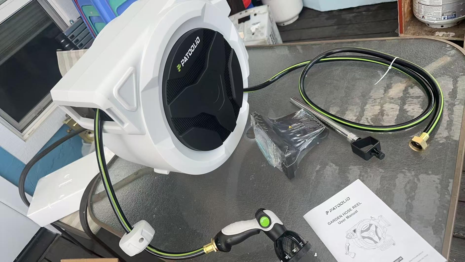Retractable Garden Hose Reel 100ft, 1/2'' Wall Mounted Water Hose Reel Heavy Duty with 10 Pattern Nozzle, Slow Auto Rewind, Any Length Lock, 180° Swivel Bracket customer photo 2
