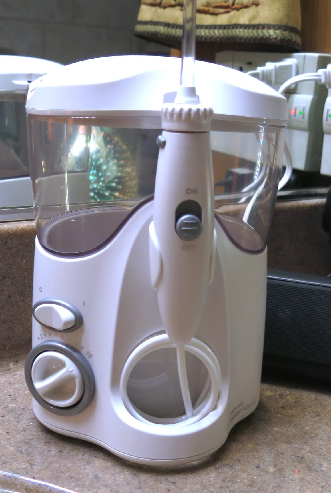 Waterpik Ultra Water Flosser, White - 90+ Seconds of Flossing Time - 10 Pressure Settings, 360-Degree Tip Rotation - Includes Six Tips & Built-in Tip Storage customer photo 2