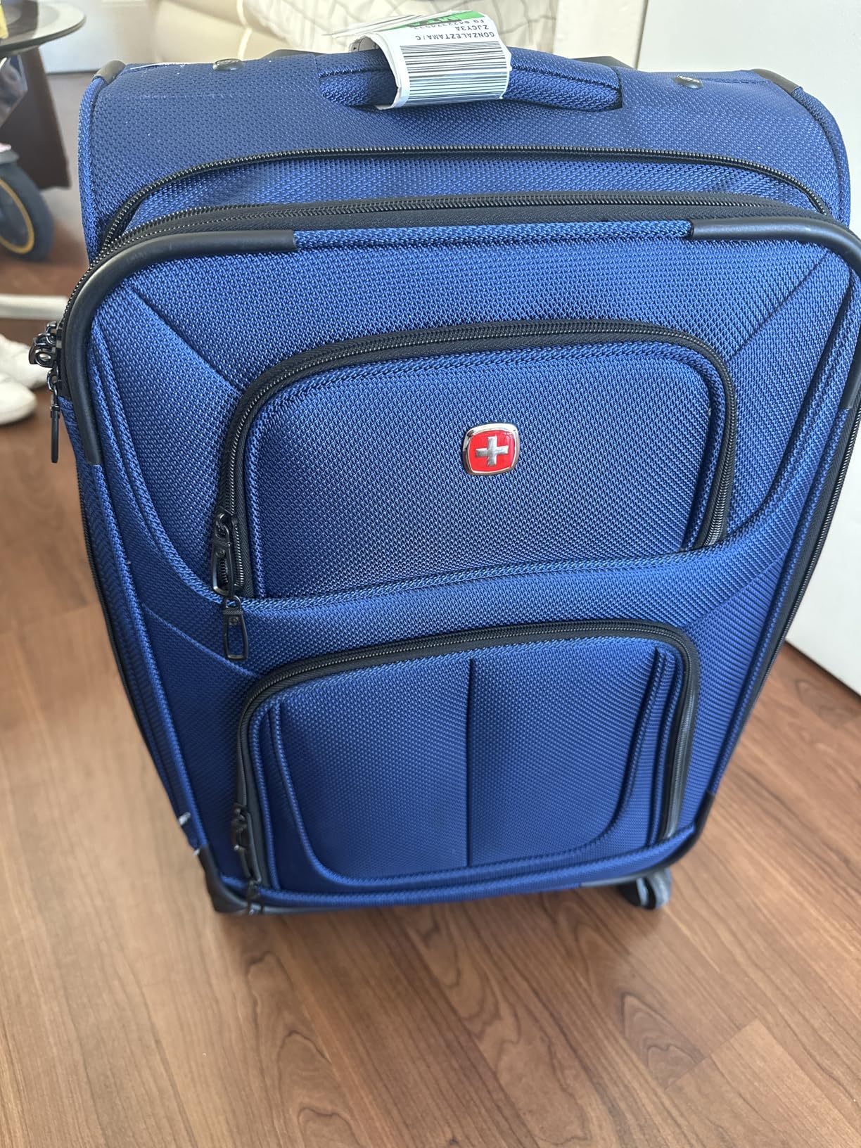 SwissGear Sion Softside Expandable Spinner Luggage Durable Lightweight Travel Suitcase, Blue, Carry-On customer photo 2