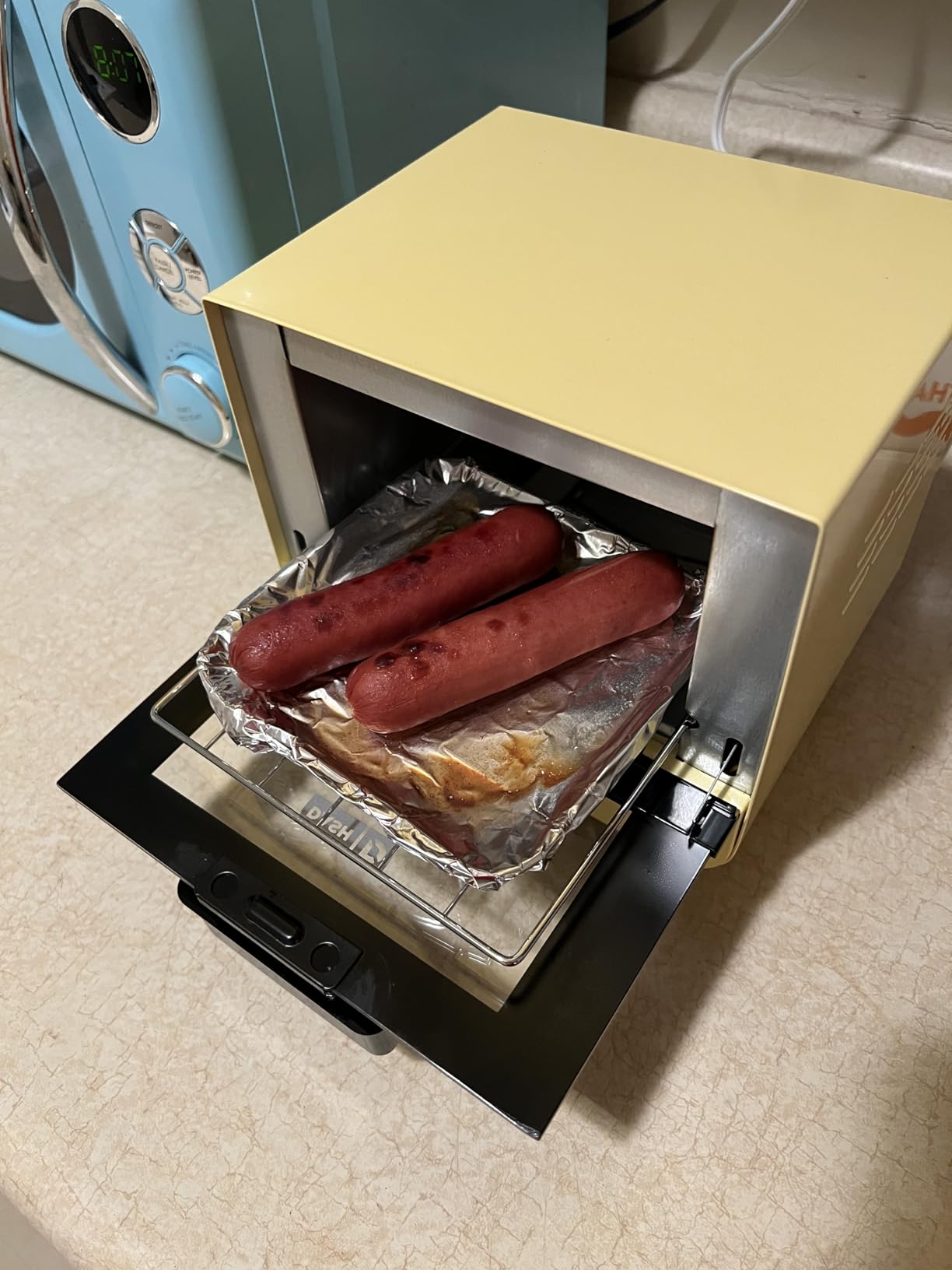 Dash Mini Toaster Oven - Sleek & Stylish - For Creative Homemade Treats - Compact, Space-Saving Design - adjustable temperature dial - Removable Baking Tray - Aqua customer photo 1