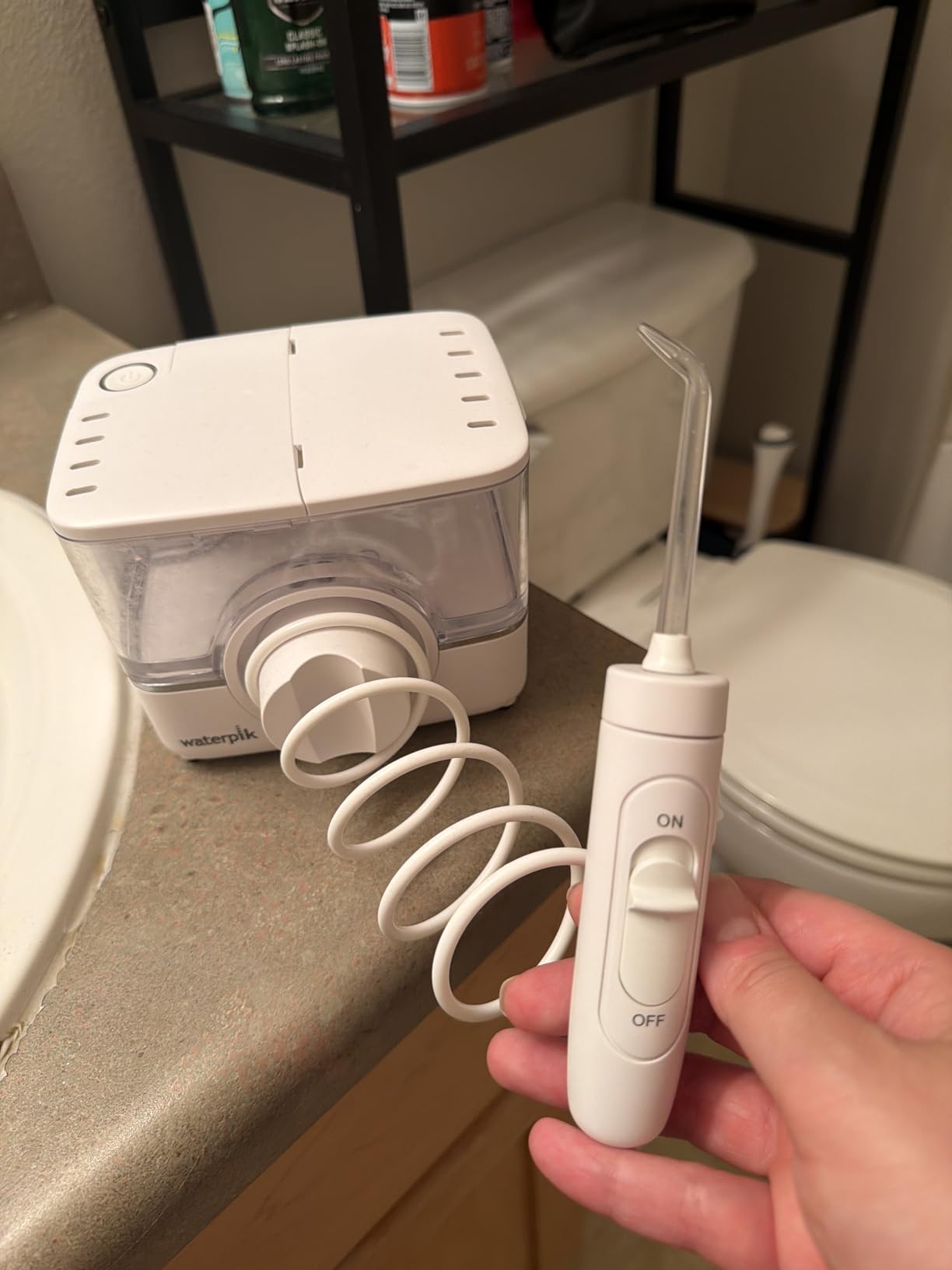 Waterpik ION Professional Water Flosser, Rechargeable and Portable for Teeth, Gums, Braces, 10 Settings, 7 Flossing Tips For Multiple Users And Needs, ADA Accepted, WF-12 Black, Packaging May Vary customer photo 2