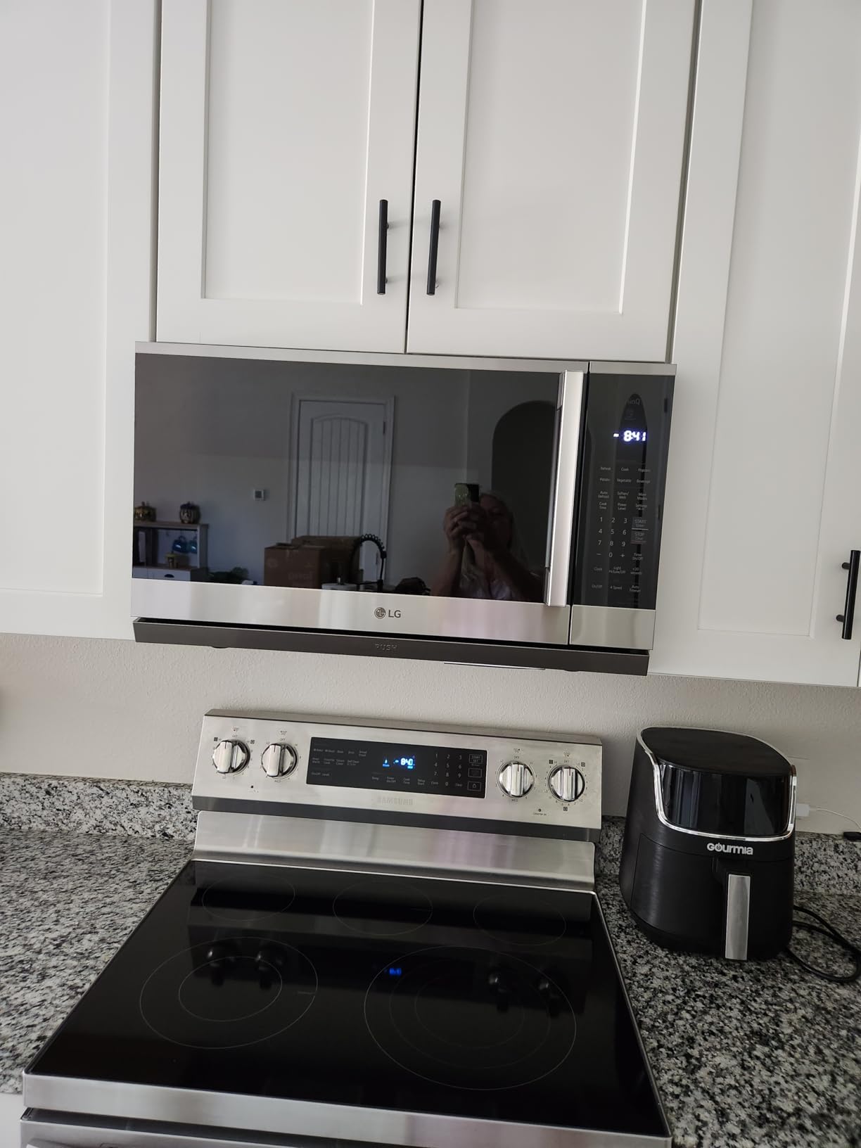 LG 2.1 cu. ft. 30 in. Width PrintProof Stainless Steel 1,050-Watt Smart Over-the-Range Microwave Oven with ExtendaVent 2.0 customer photo 1