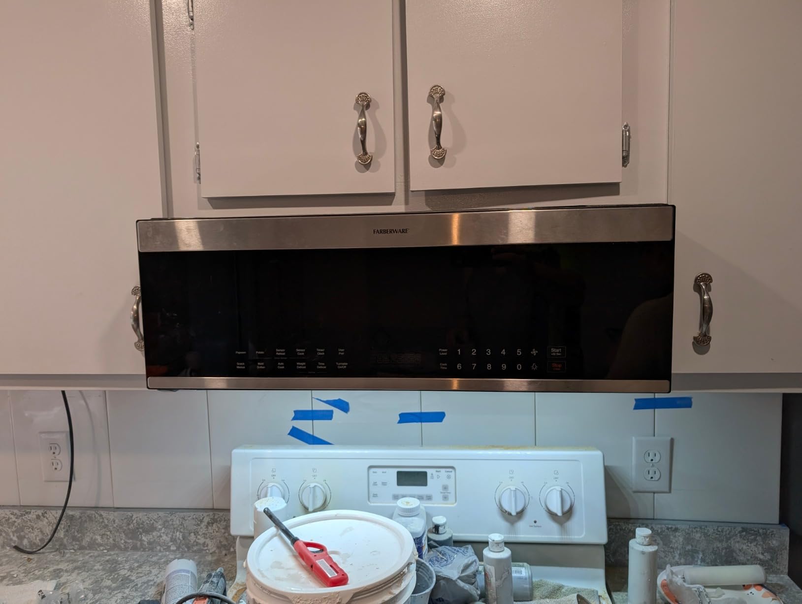 Farberware 1.7 Cu. Ft. Over-the-Range Microwave Oven - 1000 Watts Power, Auto Cook Settings, Defrost, Easy Clean and Child Safety Lock - Stainless customer photo 1