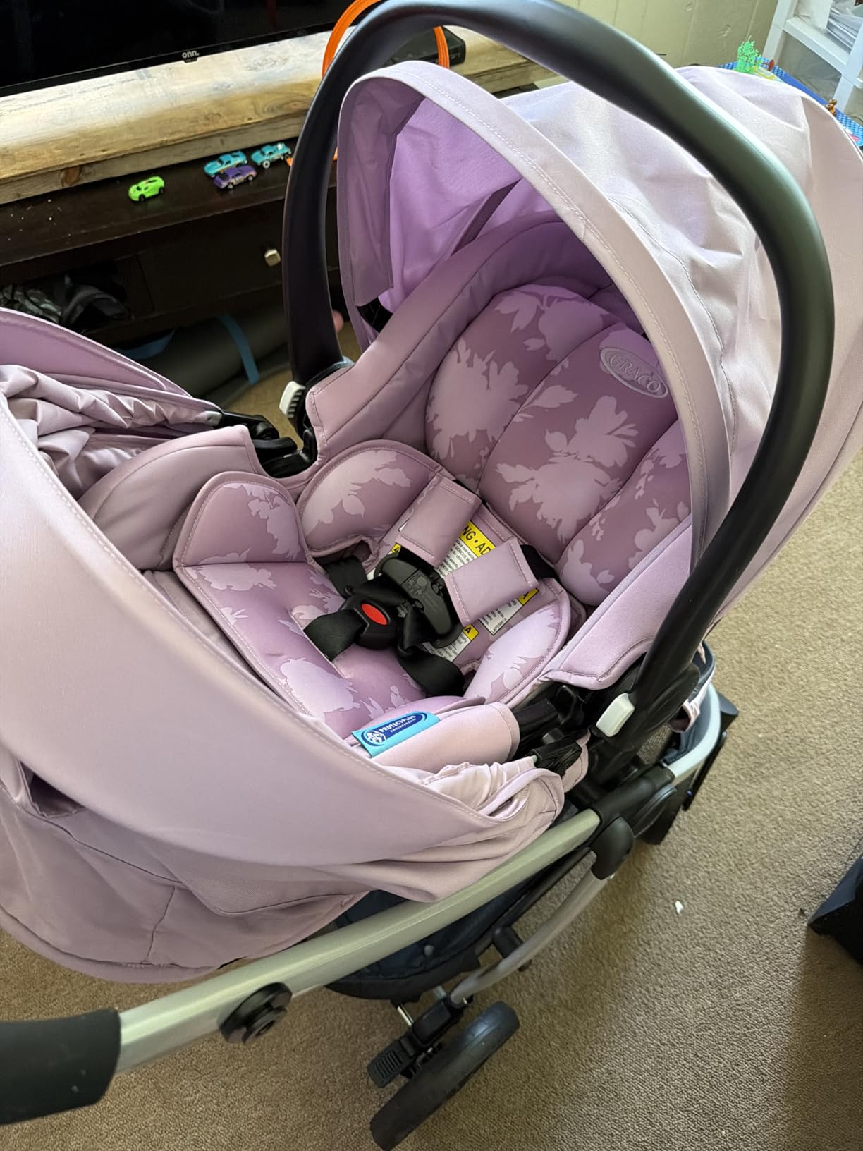 Graco Modes Pramette Travel System, Car Seat and Stroller Combo, Includes SnugRide LX Infant Car Seat and Baby Stroller with True Pram Mode, Reversible Seat, One Hand Fold, Extra Storage, Lilac Mod customer photo 2