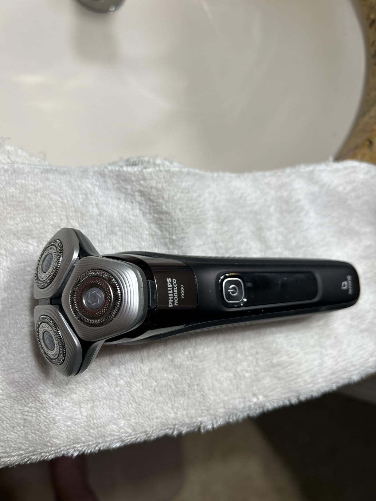 Philips Norelco Shaver i9000, Wet & Dry Electric Shaver, Ink Black, SenseIQ Technology, Triple Lift & Cut System, 360 Rotating Dual SteelPrecision Blades, Nose Trimmer, X9000/90 customer photo 1