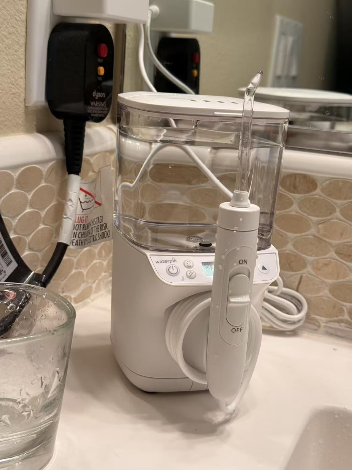 Waterpik Promax Water Flosser with SmartAdvance Mode for Daily Gum Health and Cleaning Teeth, Braces, Implants, ADA Accepted, Small Quiet Design, Electric Flosser with 10 Settings, 5 Tips, WF-23 customer photo 1