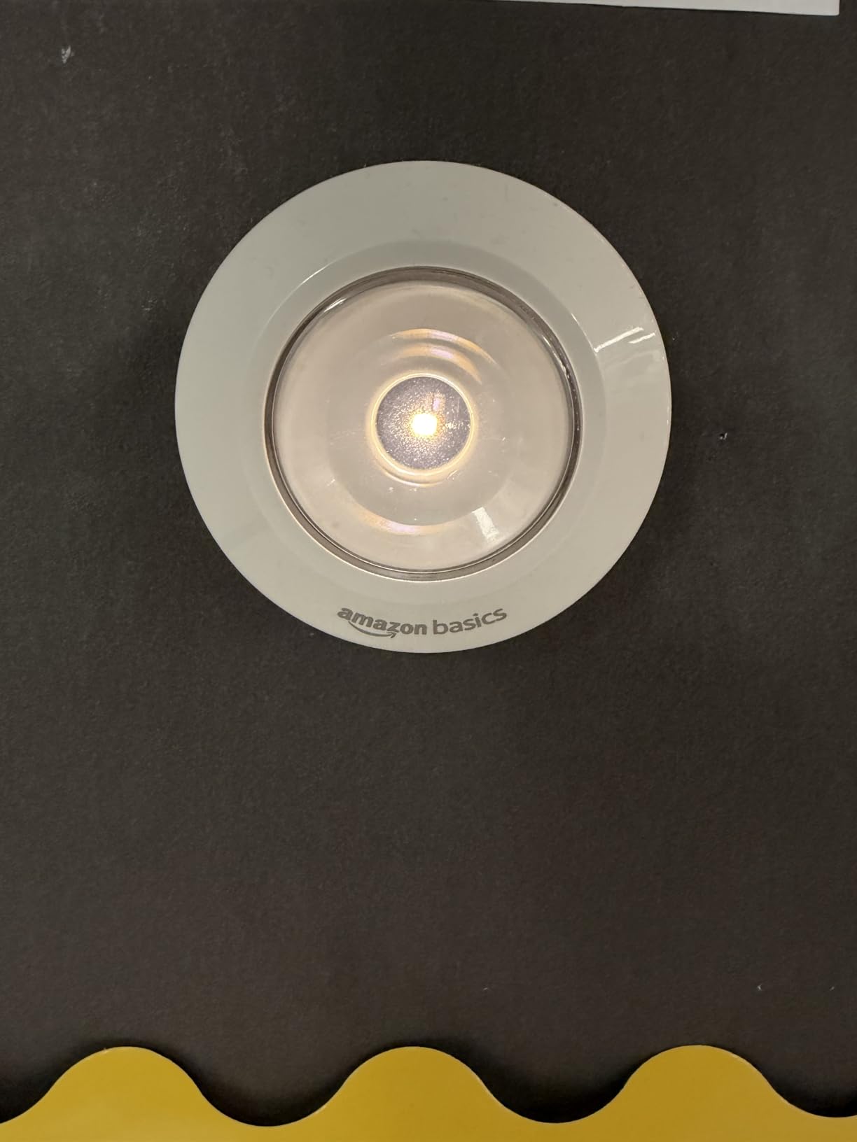 Amazon Basics LED Puck Lights, Battery Operated, 50 Lumens, Under Cabinet Lighting, Easy to Install, Easy to Use, Adhesive Backing, 2-Pack, White customer photo 1