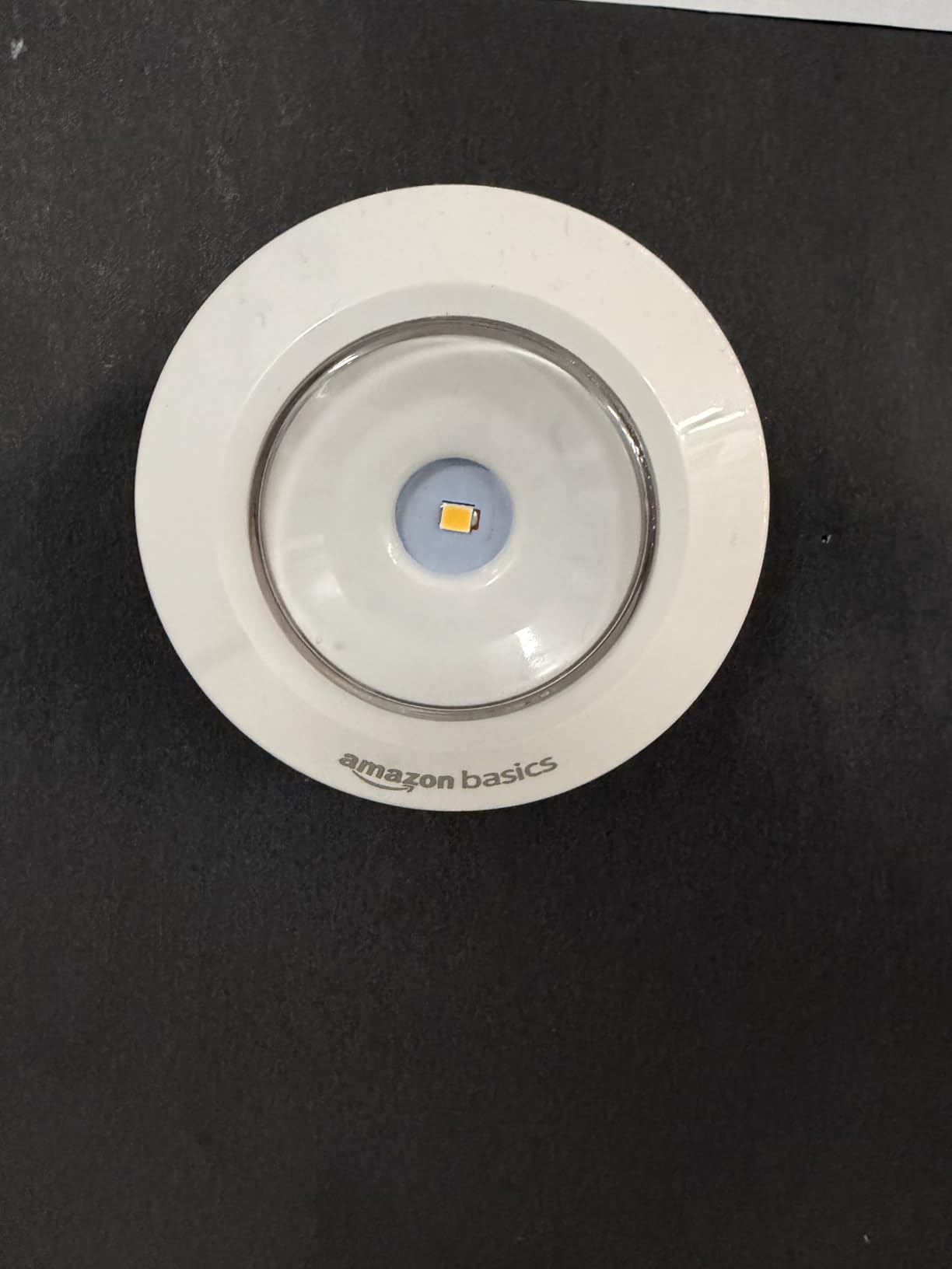 Amazon Basics LED Puck Lights, Battery Operated, 50 Lumens, Under Cabinet Lighting, Easy to Install, Easy to Use, Adhesive Backing, 2-Pack, White customer photo 2