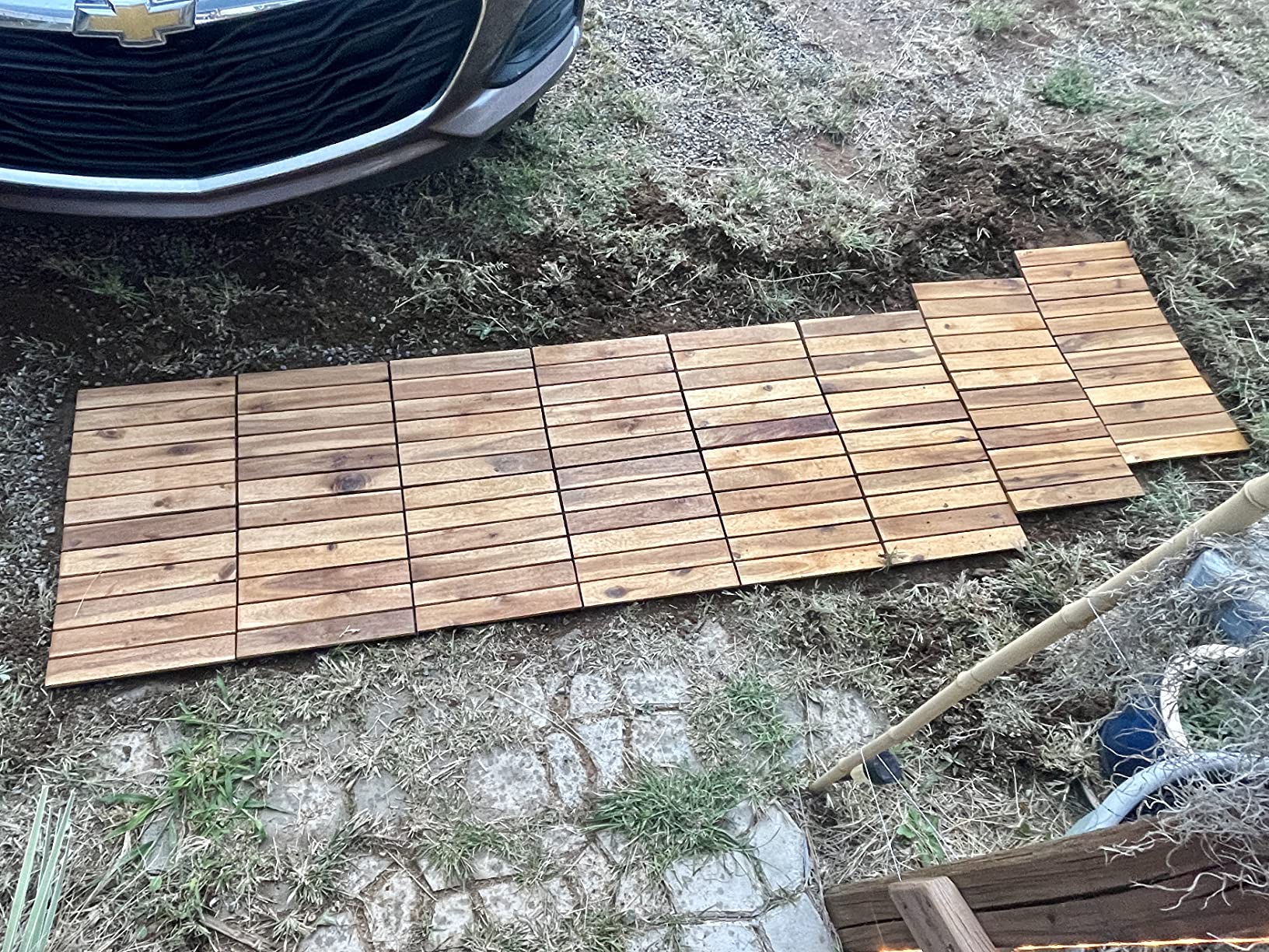 Majestick Goods Interlocking Long Slat Deck Tiles, Acacia Wood Interlocking Deck Tiles - Easy Installation for Patio Flooring & Walkway with Raised Base Drainage, 12 x 12 x 0.9 Inch (24 Count) customer photo 1
