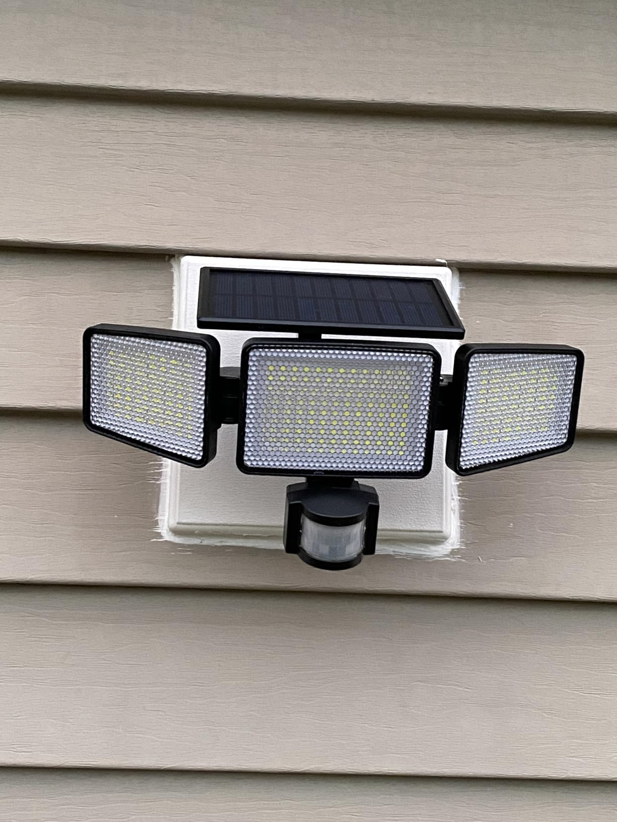 Philips Solar Security Light Outdoor 302 LED 1200lm, Solar-Powered Waterproof Wall-Mounted Flood Light w/PIR Motion Sensor, 3 Heads, IP65 Waterproof, 3 Modes (2 Packs) customer photo 1