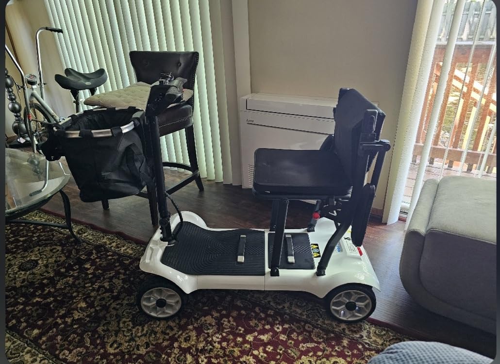 PAISEEC Ultra Lightweight Mobility Scooter for Adults, Electric Powered Mobility Scooter, 39.7 lbs Folding Design with 2 Lithium Batteries, Travel up to 18.6 Miles Airline Approved-White customer photo 2