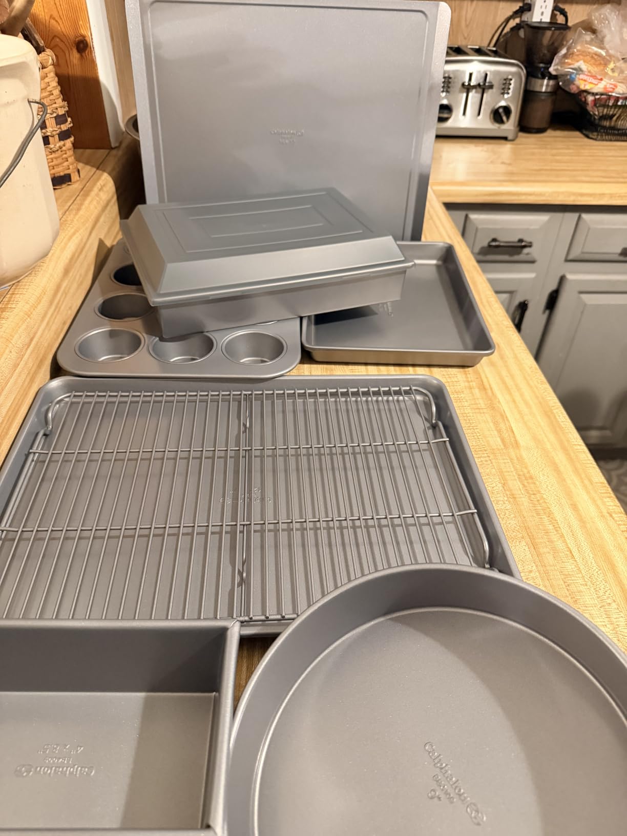 Calphalon Titan 10-Piece Nonstick Bakeware Set, Baking Sheet Set, Steel Core PFA-Free Nonstick Coating, Oven Safe, Includes Sheet Pans, Muffin Pan, Round Cake Pans, Loaf Pan and Cooling Rack - Silver customer photo 2