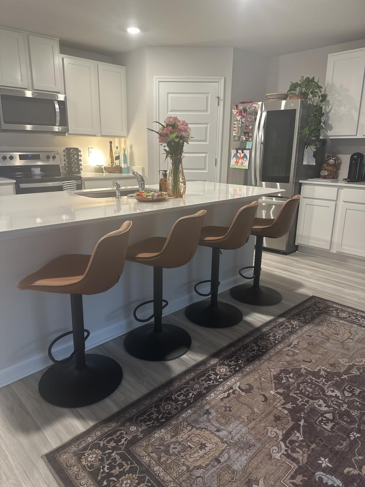 VASAGLE Bar Stools Set of 4, Adjustable Height Swivel Barstools with Ergonomic Backrest, Synthetic Leather, Larger Metal Base, Modern Tall Bar Chairs for Kitchen Island, Caramel Brown customer photo 2
