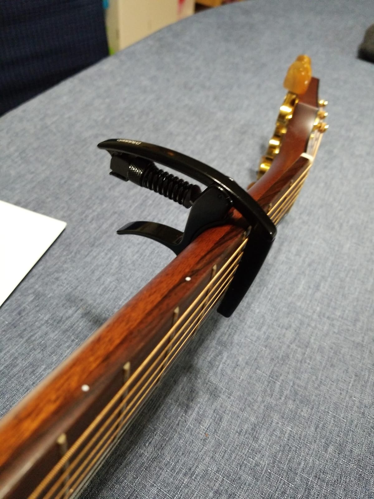 D'Addario Guitar Capo - NS Tri Action - For 6-String Electric and Acoustic Guitars - Micrometer Tension Adjustment for Buzz-Free, In-Tune Performance - Single Hand Use - Integrated Pick Holder - Silver customer photo 2
