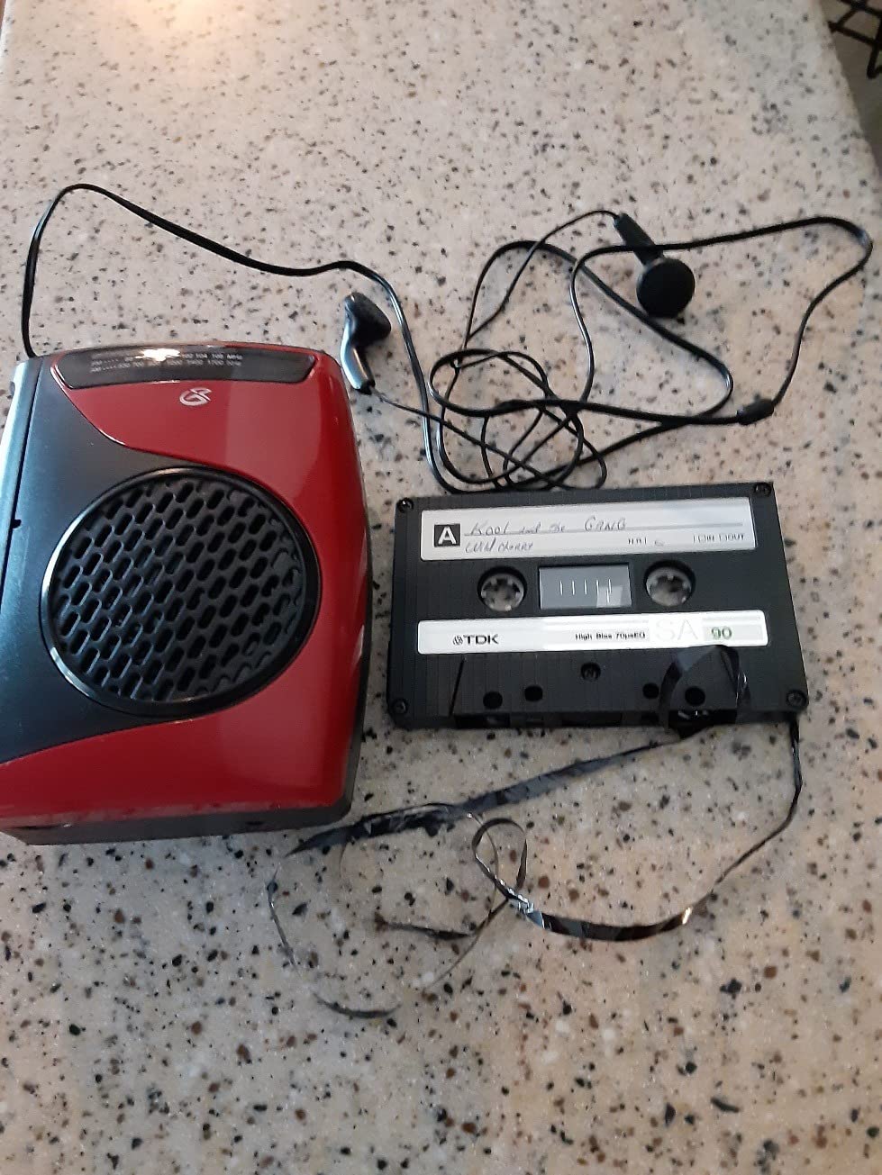 GPX Portable Cassette Player, Compatible With Headphone, 3.54 x 1.57 x 4.72 Inches, Requires 2 AA Batteries - Not Included, Red/Black (CAS337B) Black/Red customer photo 1