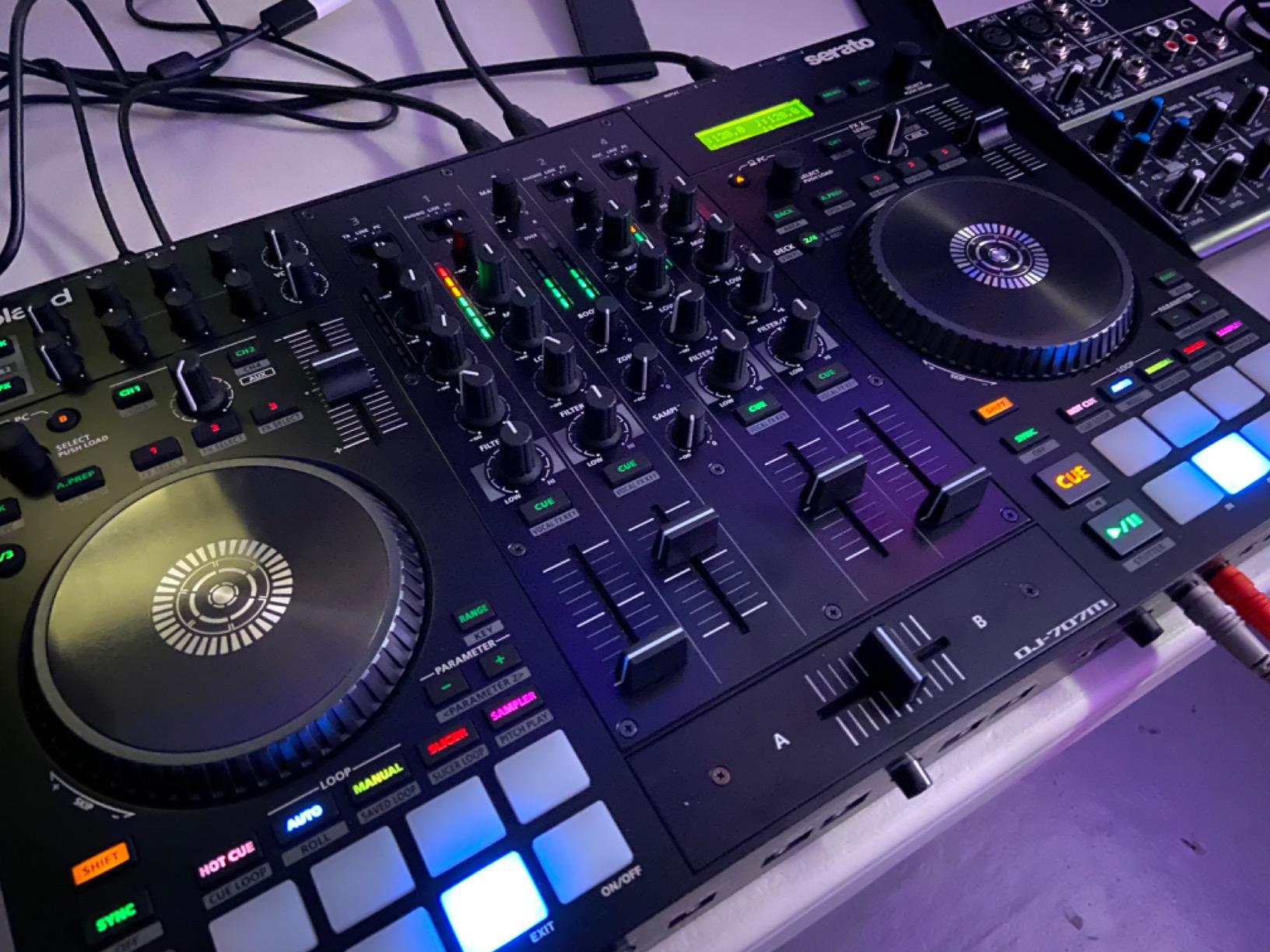 Roland DJ-707M DJ Controller | 4-channel Serato DJ controller with dual USB and feedback suppression for mixing, performance and loudspeaker management customer photo 1
