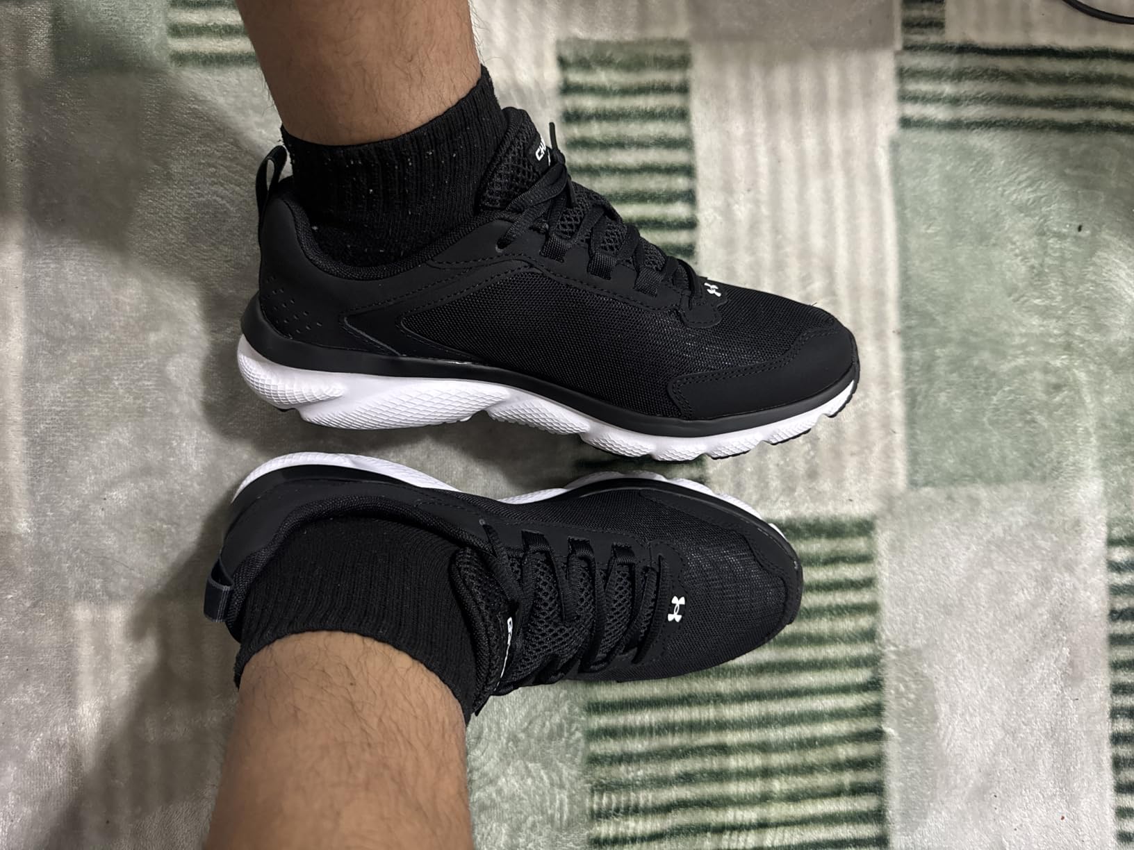 Men's Charged Assert 9 Running Shoe customer photo 1