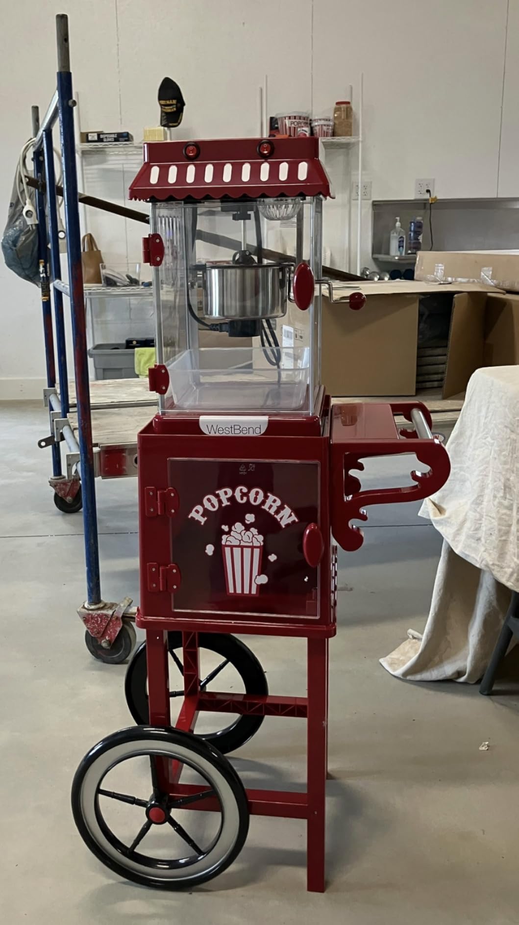 West Bend Popcorn Popper Machine Theater Style on Wheeled Cart with Non-Stick 2.5 Oz Stainless Steel Popcorn Kettle, Storage Shelf, and Popcorn Scoop, 10-Cup, Red customer photo 1