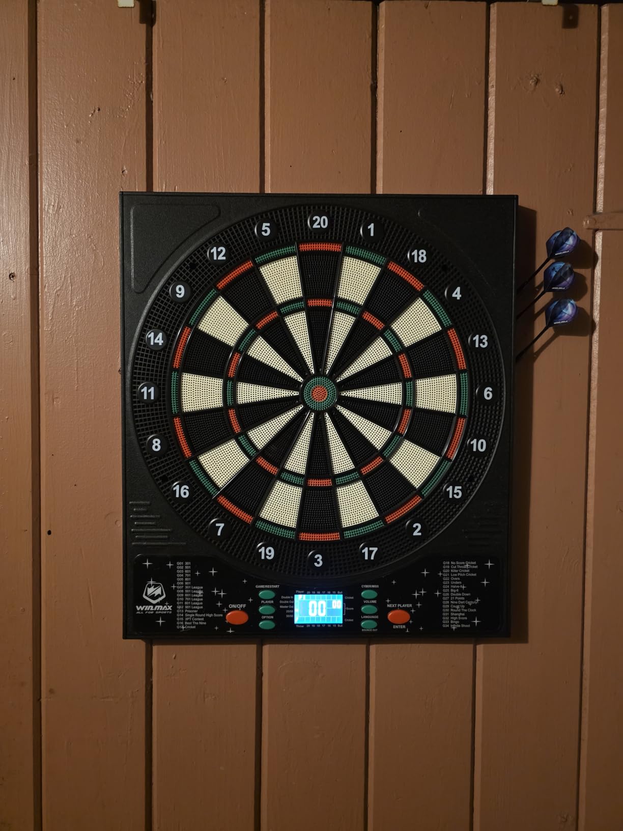 WIN.MAX Electronic Dart Board, Soft Tip Digital Dartboard for Adults, 34 Games 355 Variants Auto Scoring, 12 Darts 100 Tips, Adapter/Batteries, LCD Display Wall Mount for Home Bar Party Game Room customer photo 1