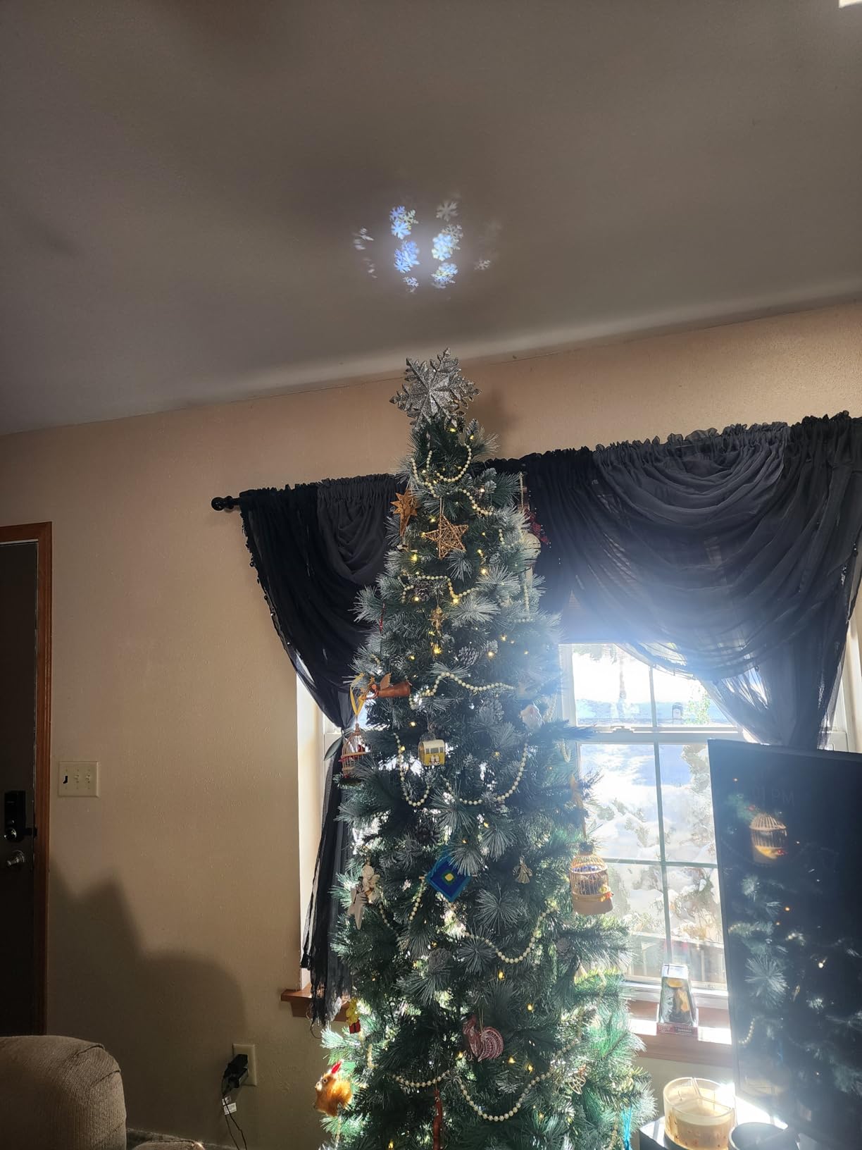 DG-Direct Christmas Tree Topper with Rotating Snowflake Projector, Silver | Rotating Snowflake Projection, Warm LED Light, 3D Hollow Design, Easy Tree Installation customer photo 2
