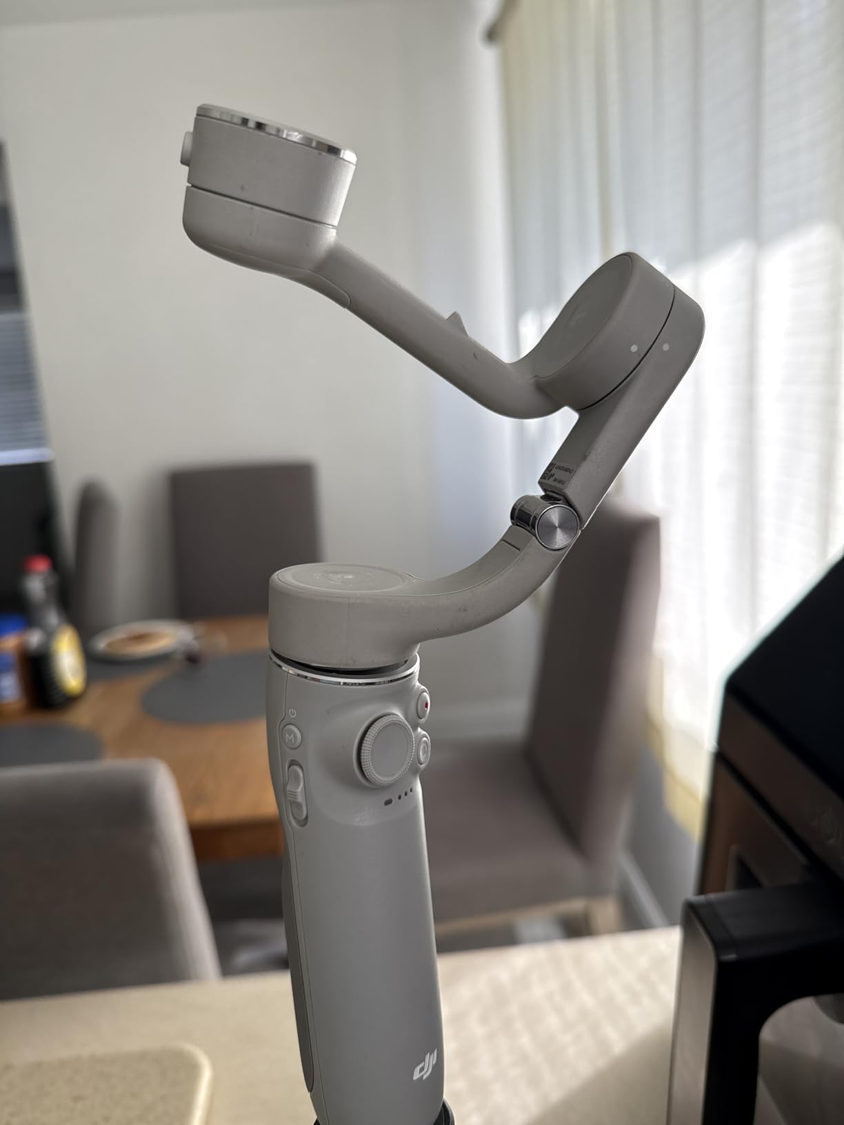 DJI OM 5 Smartphone Gimbal Stabilizer, 3-Axis Phone Gimbal, Built-In Extension Rod, Portable and Foldable, Android and iPhone Gimbal with ShotGuides, Vlogging Stabilizer, YouTube Video, Sunset White customer photo 2