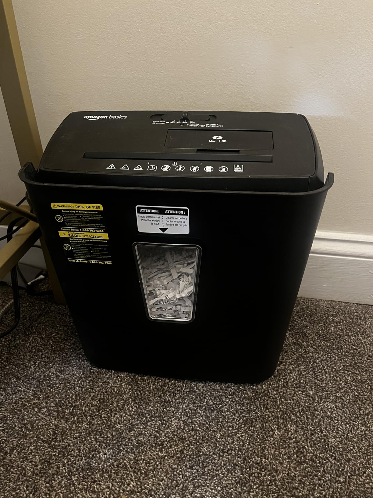 Amazon Basics 8-Sheet Strip Cut Portable Paper, CD, and Credit Card Shredder with Auto-Off, Overheat Protection, Compact Design, No Basket, Extendable Arm, Black customer photo 1