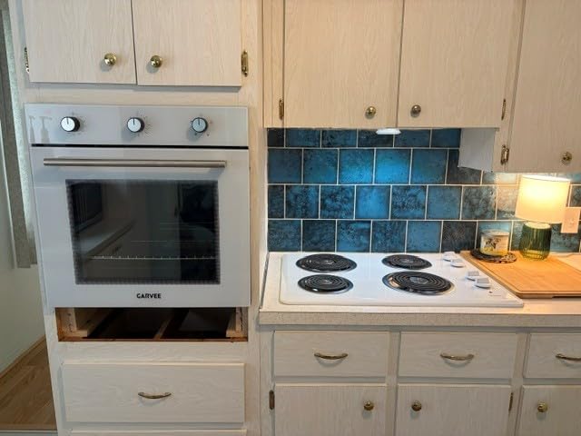 Garvee 24 Inch Built-in Single Wall Oven, 2.5 Cu.ft. Electric Oven with 5 Cooking Functions, 3000W Power, Touch and Knob Control, Low-e Glass Door & Cooling Fan, Easy Clean Enamel, Black customer photo 1